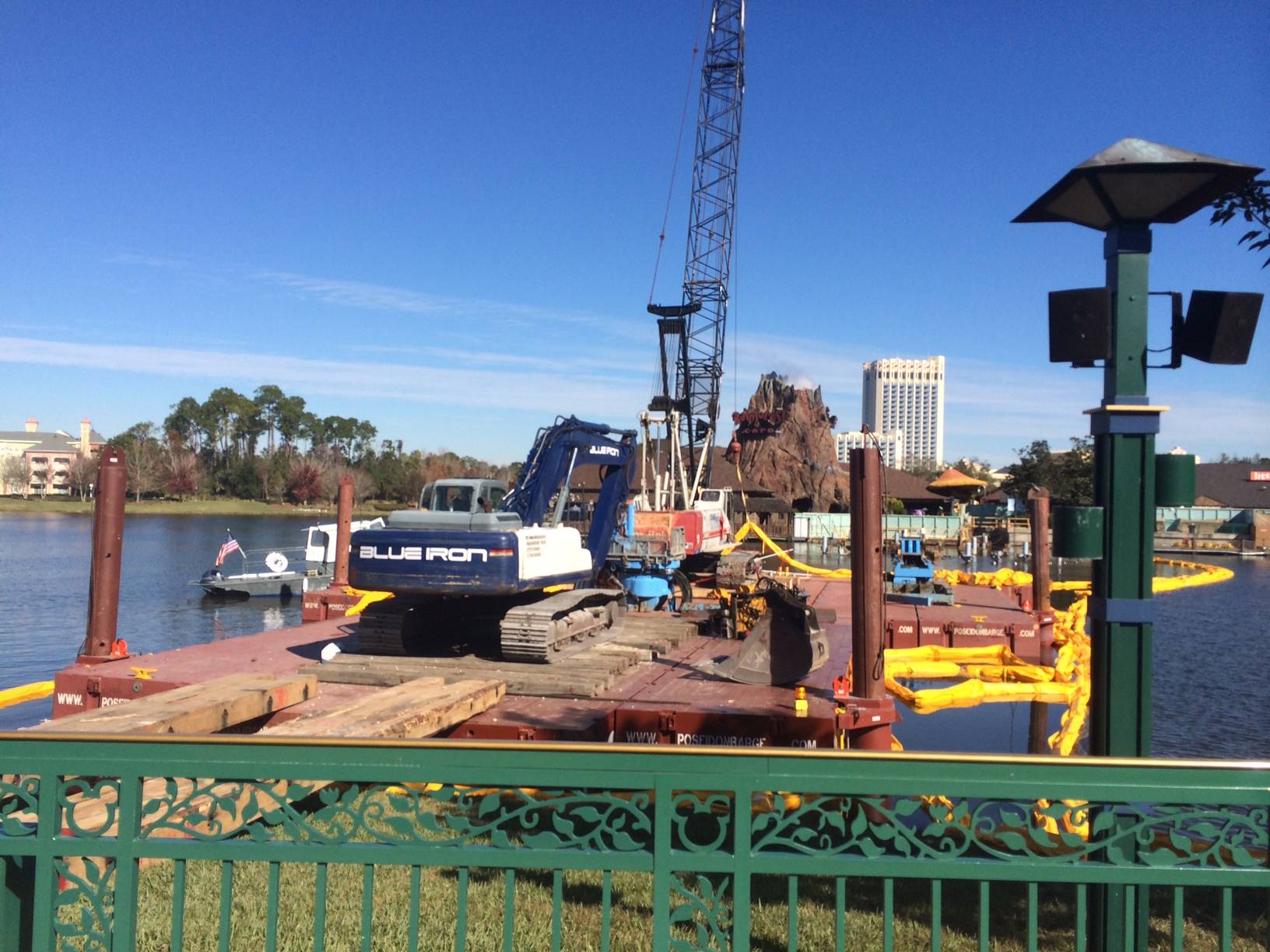 PHOTOS - Barge-based cranes take up position in the Downtown Disney Village Lake to begin the Marketplace Causeway bridge