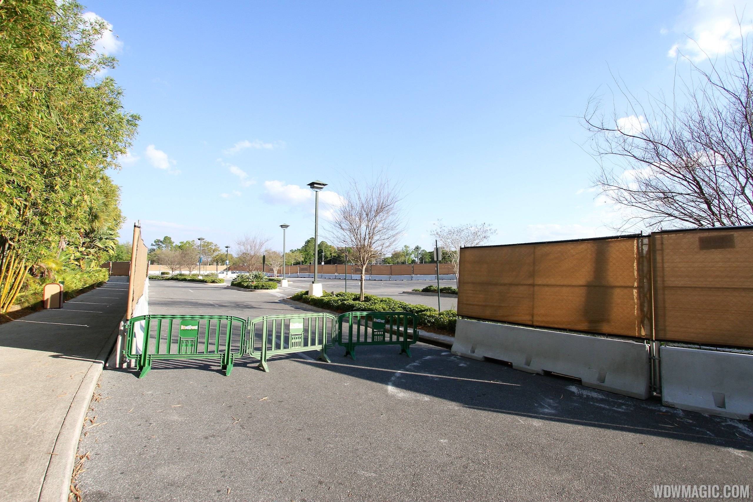 Construction walls up around Pollo Campero and parts of parking lot E, F, G