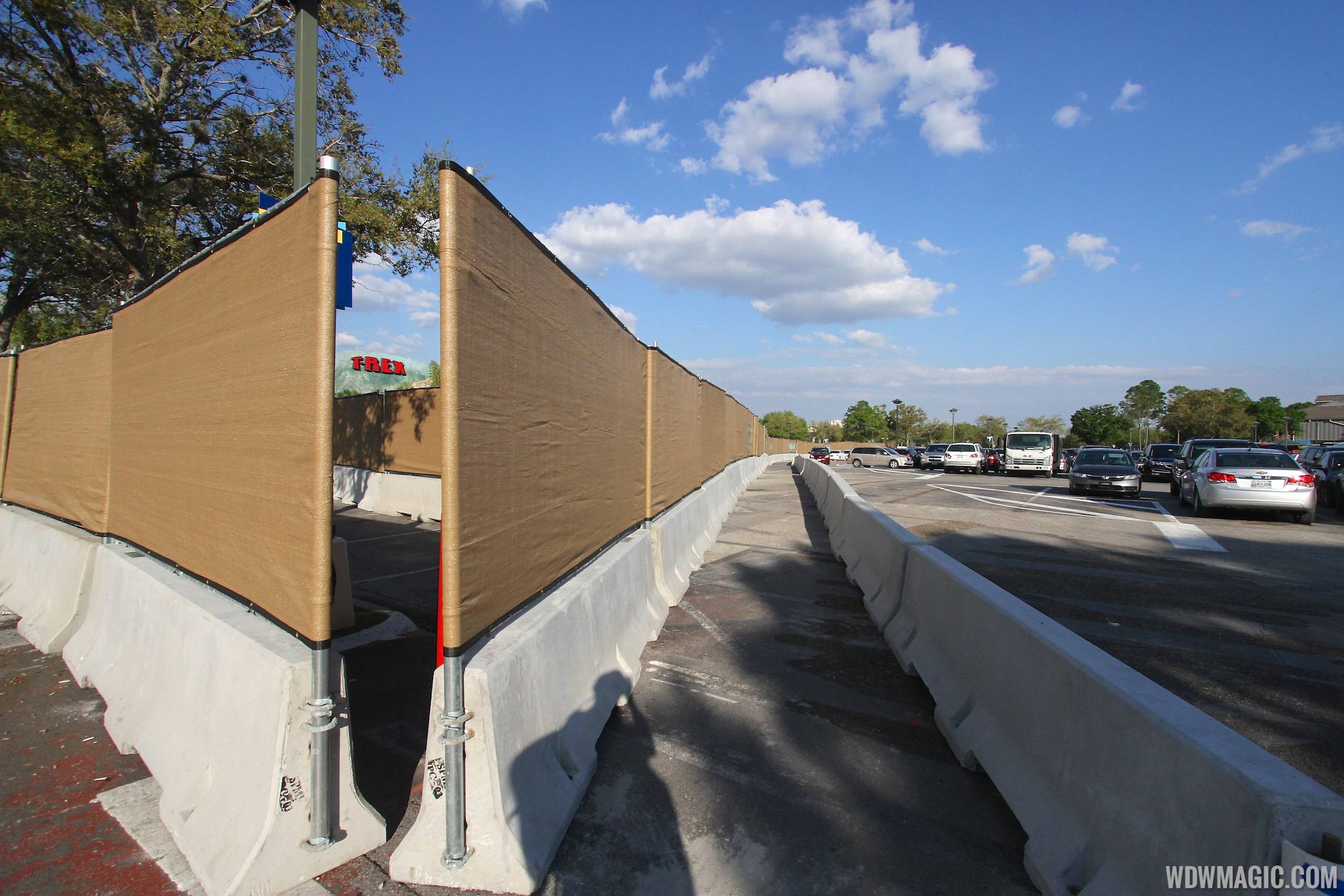 PHOTOS - Construction walls up around the now closed Pollo Campero and parking lots E,F,G