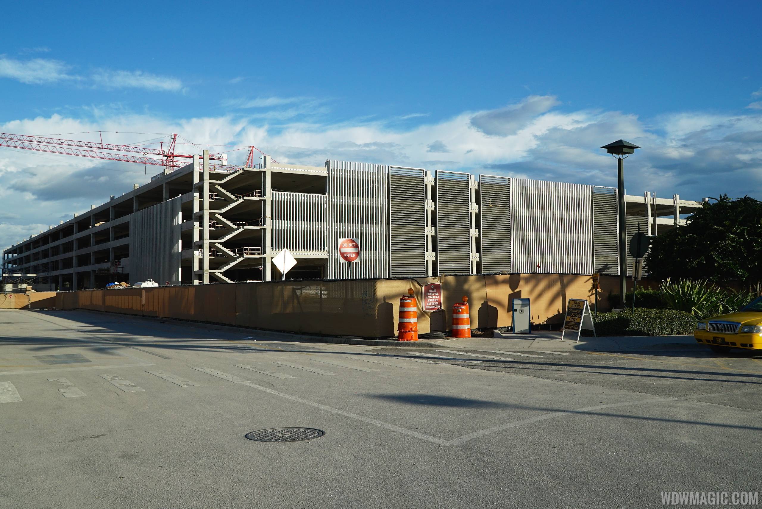PHOTOS - Exterior facades now being added to the Disney Springs West Side parking garage