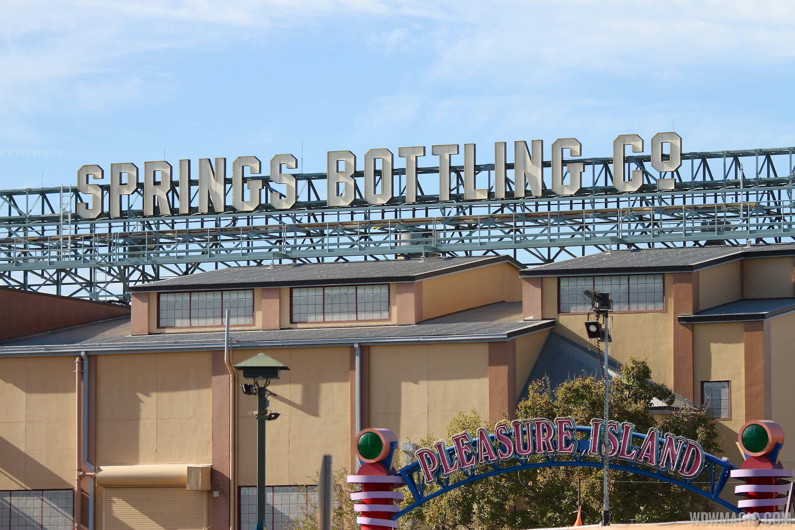 PHOTOS - Springs Bottling Co signage now up at Disney Springs