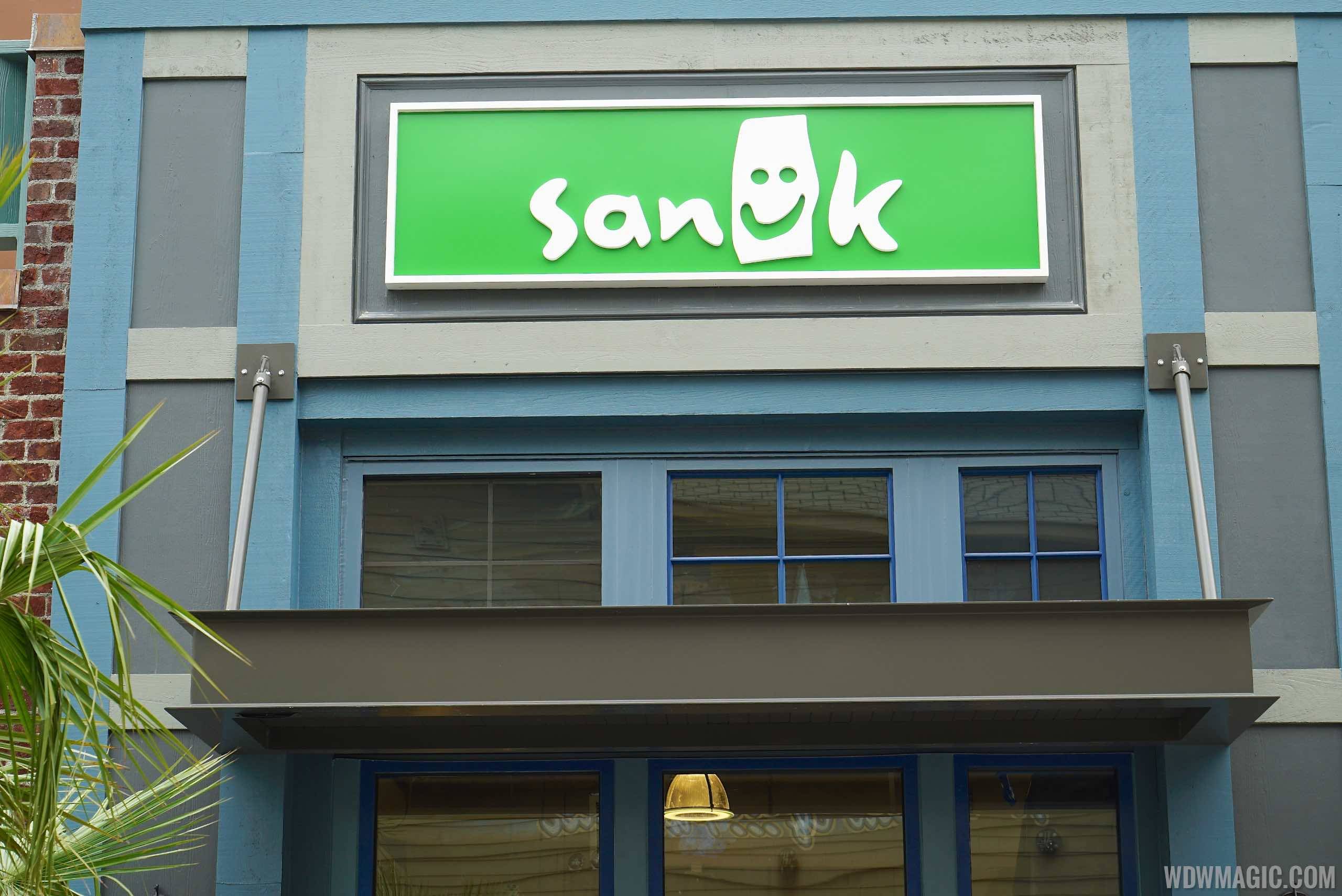PHOTOS - Signage goes up at new Sanuk store in Disney Springs