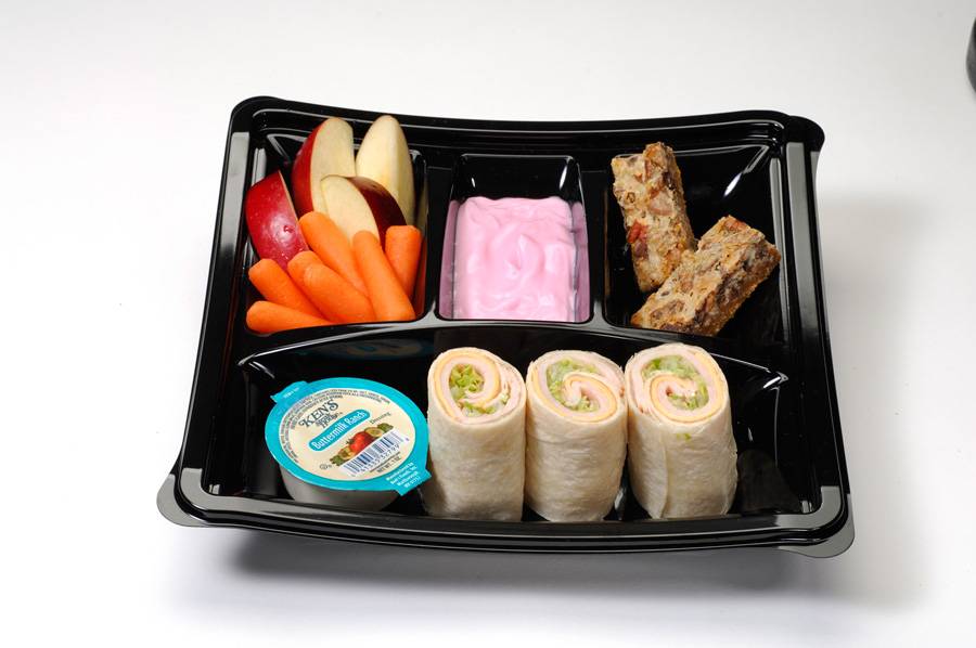 Kid’s meal with turkey and American cheese wrap and strawberry yogurt, apples and carrots with ranch dip and seven-layer cookie bar ($5.49) 