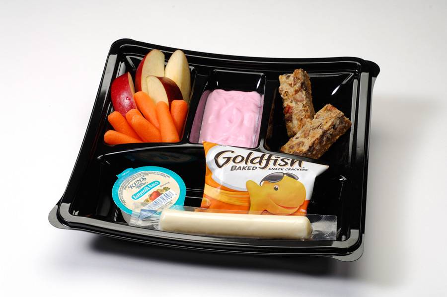 Kid’s meal Power Pack with Goldfish crackers, strawberry yogurt, string cheese, apples and carrots with ranch dip and a seven-layer cookie bar ($5.49) 
