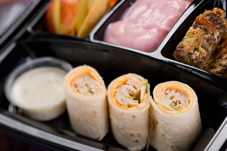 Turkey and American cheese wrap with apples and carrots with Ranch dip, strawberry yogurt and a seven-layer cookie bar available with Fantasmic! Seats at Disney’s Hollywood Studios