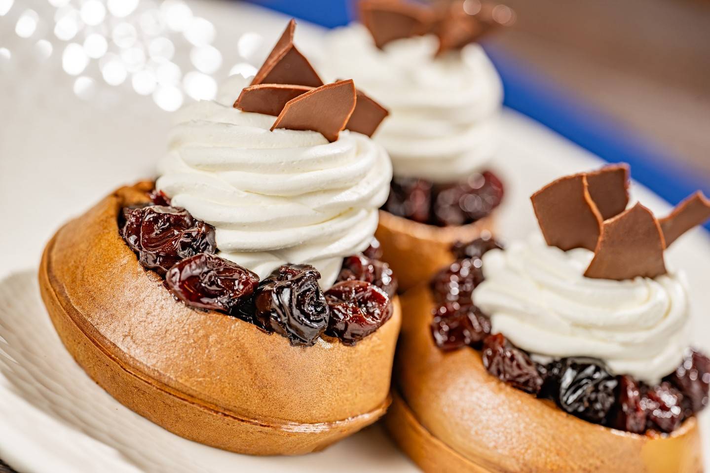 Dark Chocolate Waffles: Dried cherry compote, epresso-mascarpone cream, chocolate shavings