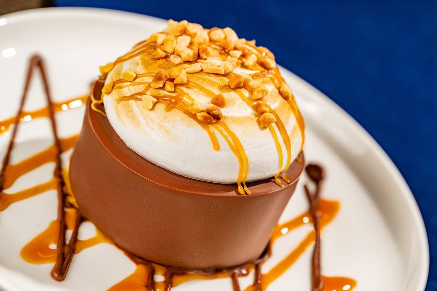 Peanut Butter-Marshmallow Cup (Plant-based): Plant-based peanut butter mousse, potato meringue, chocolate shell