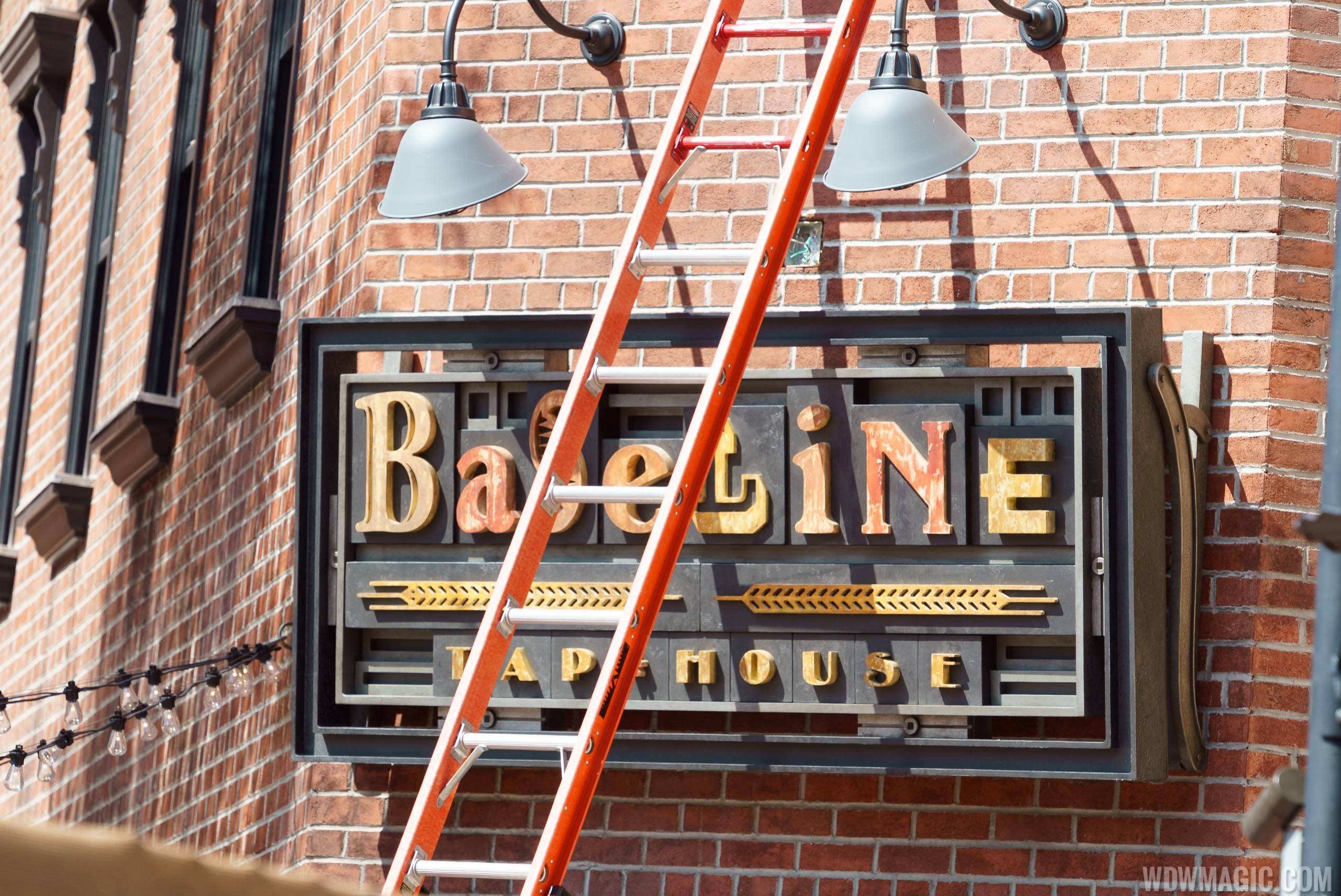 Signage installation at Baseline Tap House and Grand Avenue