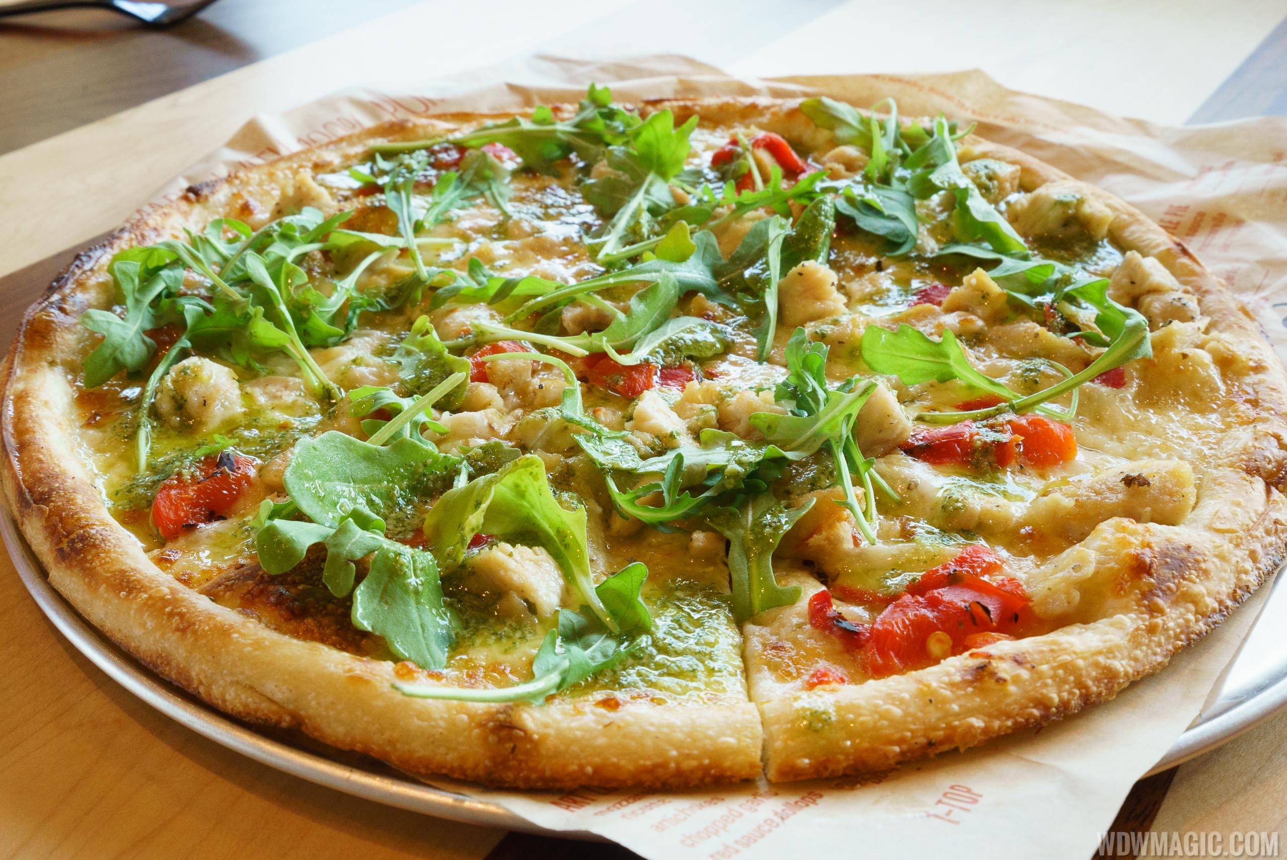 Blaze Pizza - Green Stripe signature pizza - Pesto Drizzle over Chicken, Red Peppers, Garlic, Mozzarella and Arugula