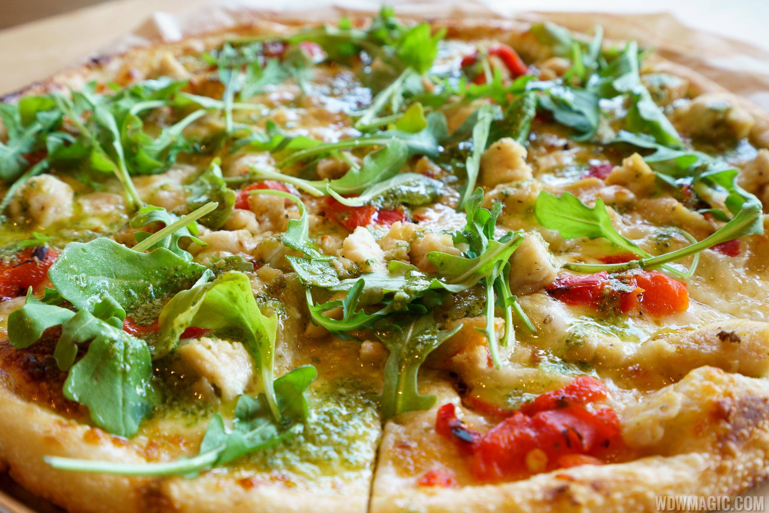Blaze Pizza - Green Stripe signature pizza - Pesto Drizzle over Chicken, Red Peppers, Garlic, Mozzarella and Arugula
