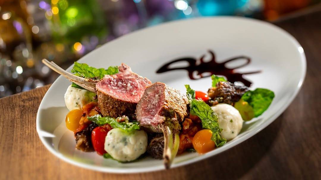 Domestic Lamb: Herb-ricotta gnudi, fava beans, stinging nettles, root spinach, tomato ragù, and red wine jus