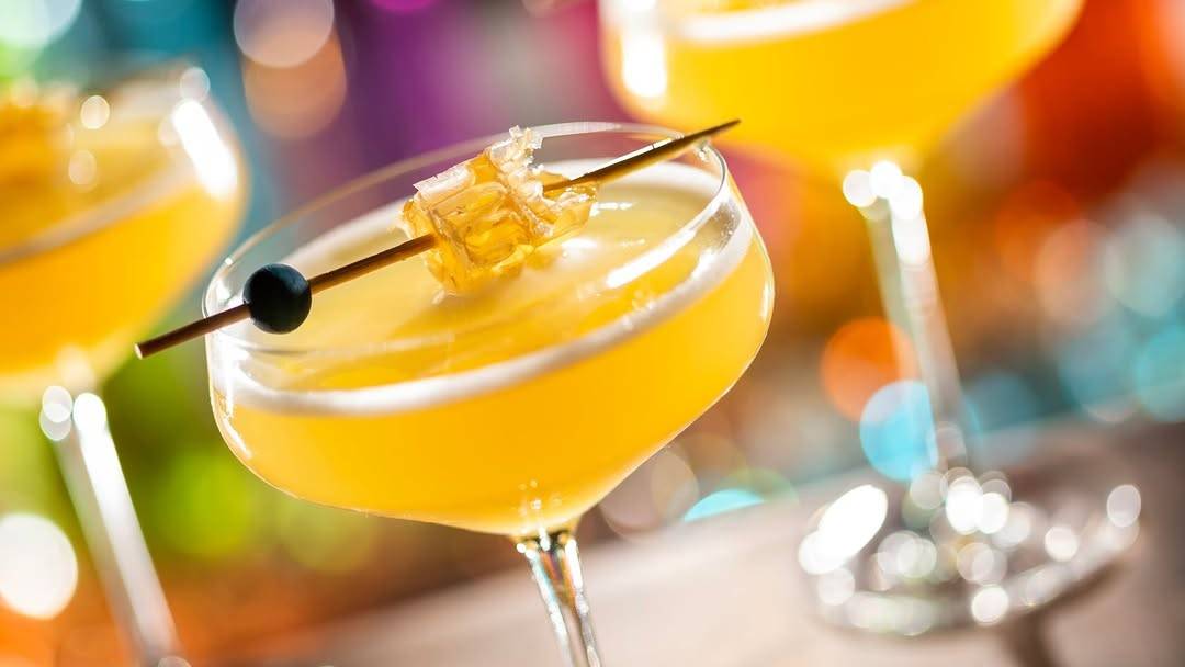 Honeycomb Fizz: Casamigos Blanco Tequila, house-made lemon and honey syrup, peach nectar, and Domaine Carneros Brut