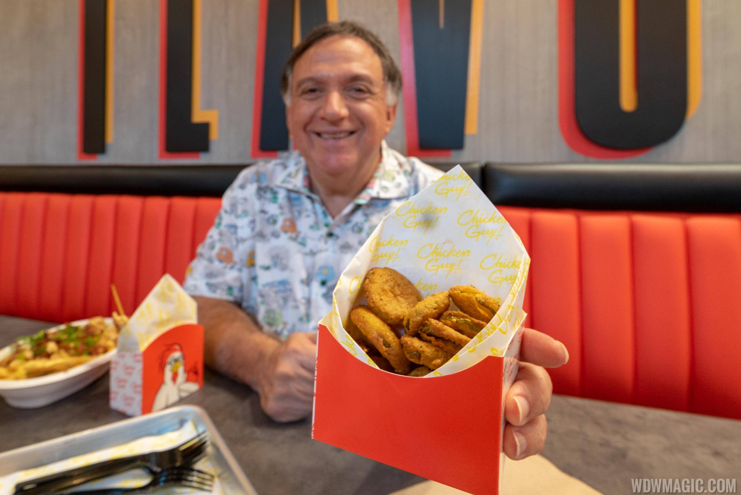 Chicken Guy! - Owner Robert Earl with one of his favorite sides - Fried Pickles