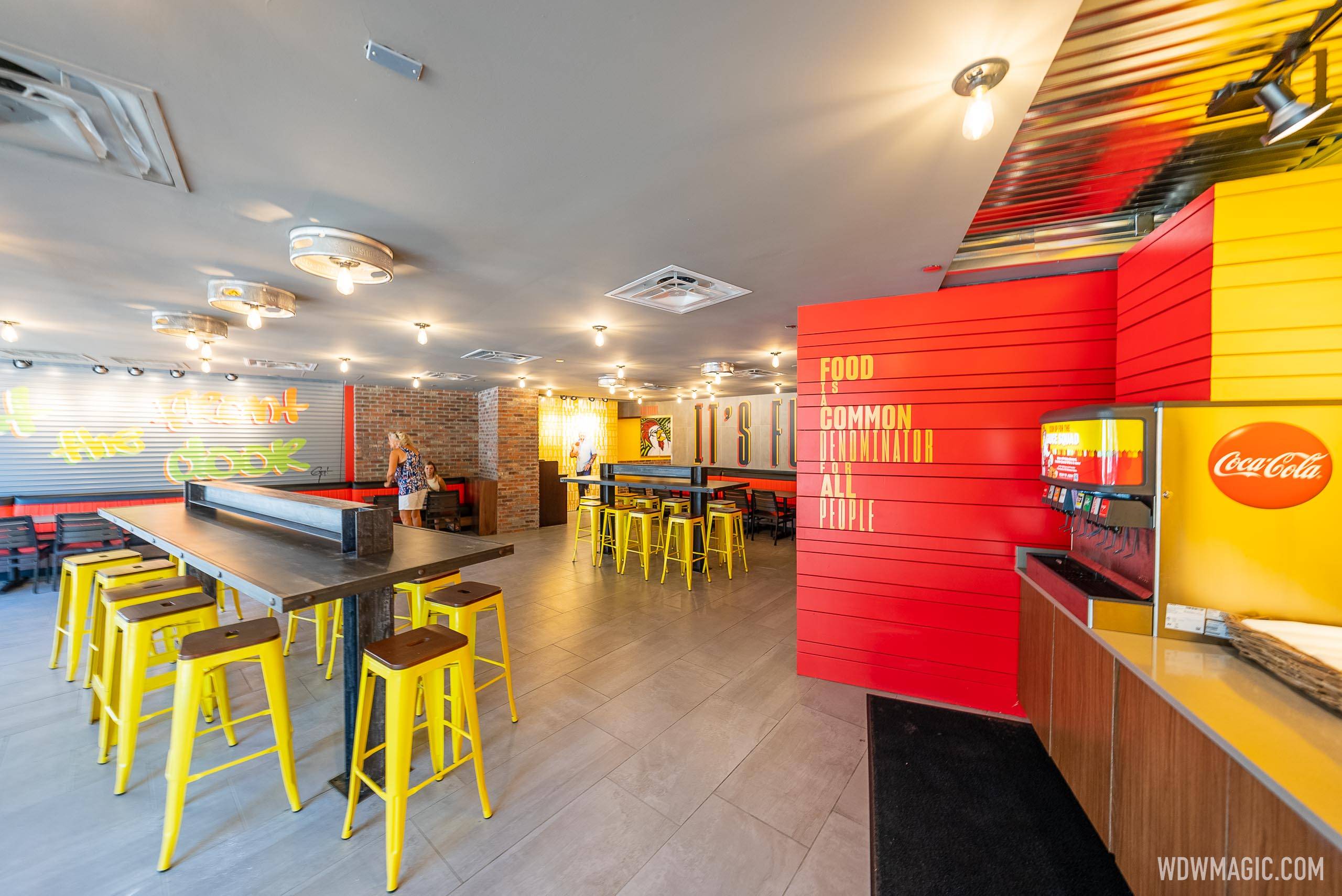 The new dining room features colorful graphics and a picture of Guy Fieri