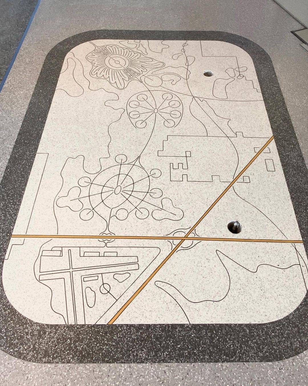 Flooring at Connections Cafe and Eatery draws inspiration from original Walt Disney World and EPCOT concepts and plans