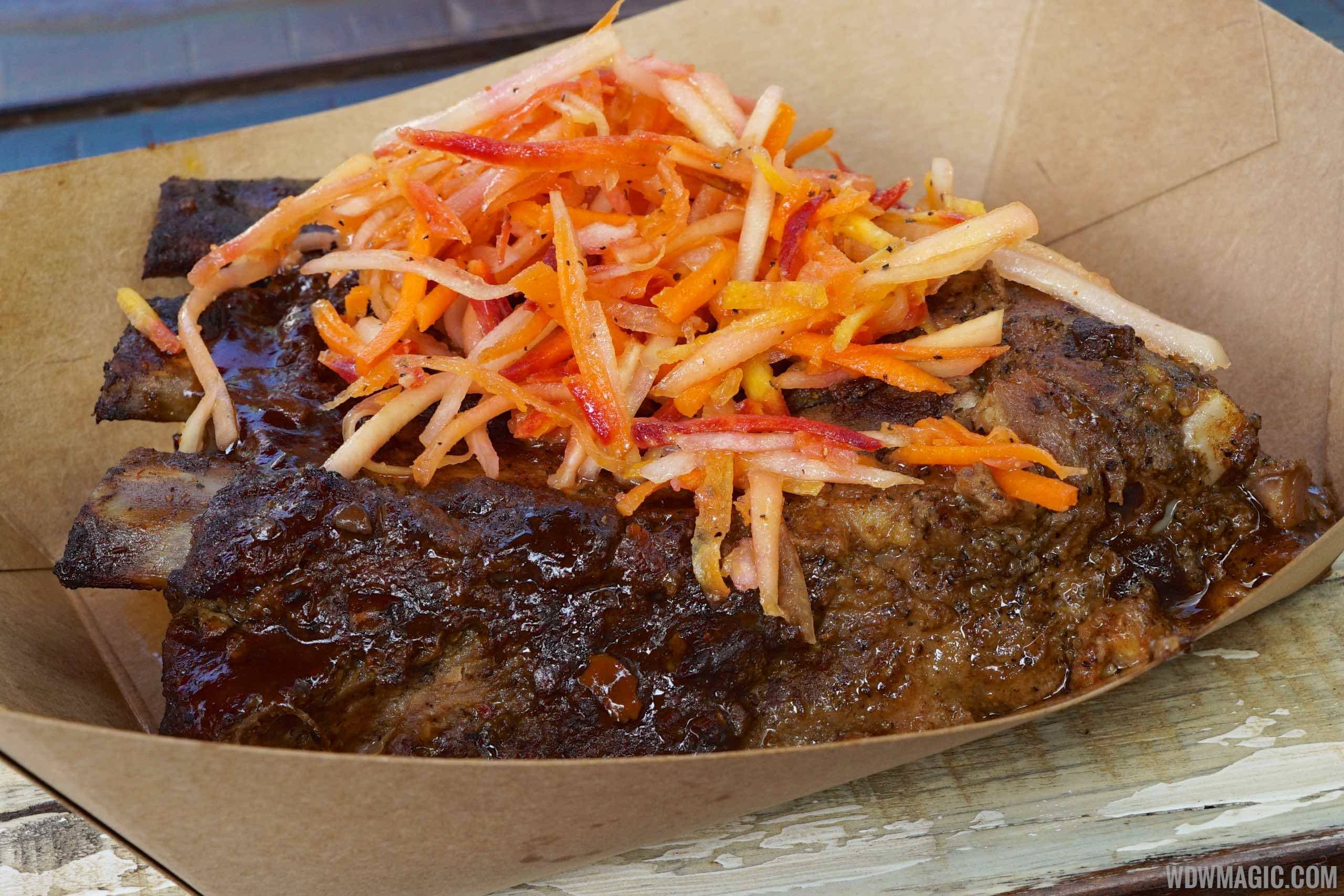 Harambe Market Food - Spice-rubbed Karubi Ribs with green papaya-carrot slaw and a chickpea cucumber and tomato salad $13.39