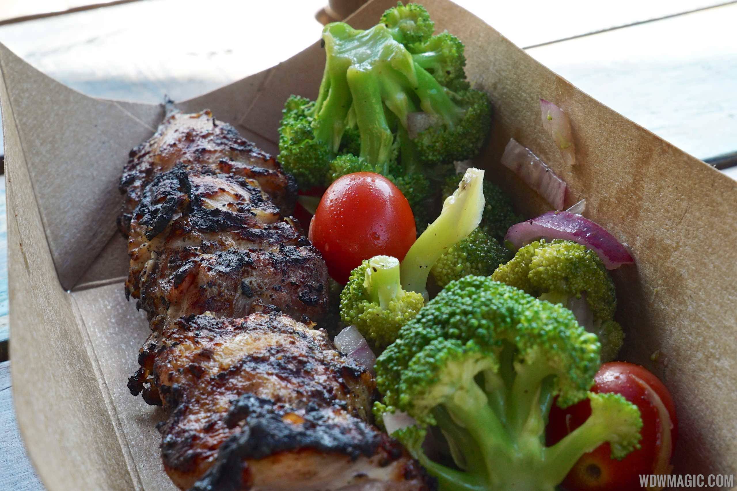 Harambe Market Food - Chicken Skewer with broccoli and tomato salad $8.99