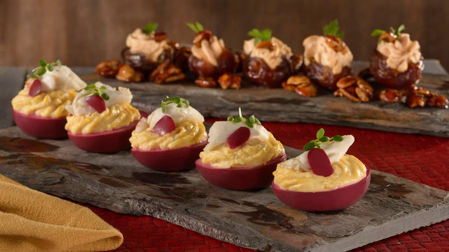 Dr. Elsa’s She-Deviled Eggs brined in beet juice with lump crab filling and “Good” Dates - goat cheese-stuffed dates with Marcona almonds and pickled veggies