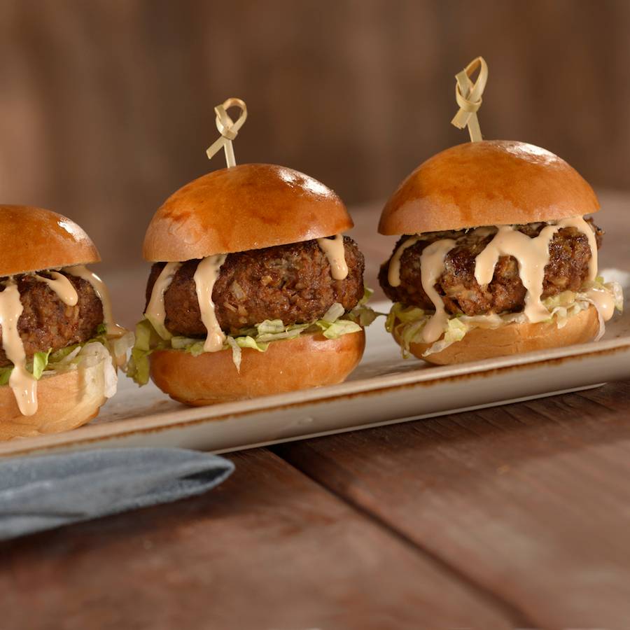 Rolling Boulder Sliders with three spice meatballs on mini-buns with yogurt sauce