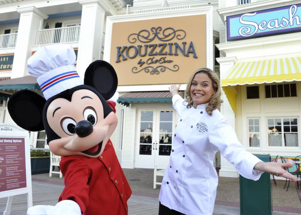 Cat Cora and Mickey Mouse at the grand opening of Kouzzina by Cat Cora. Copyright 2009 The Walt Disney Co.