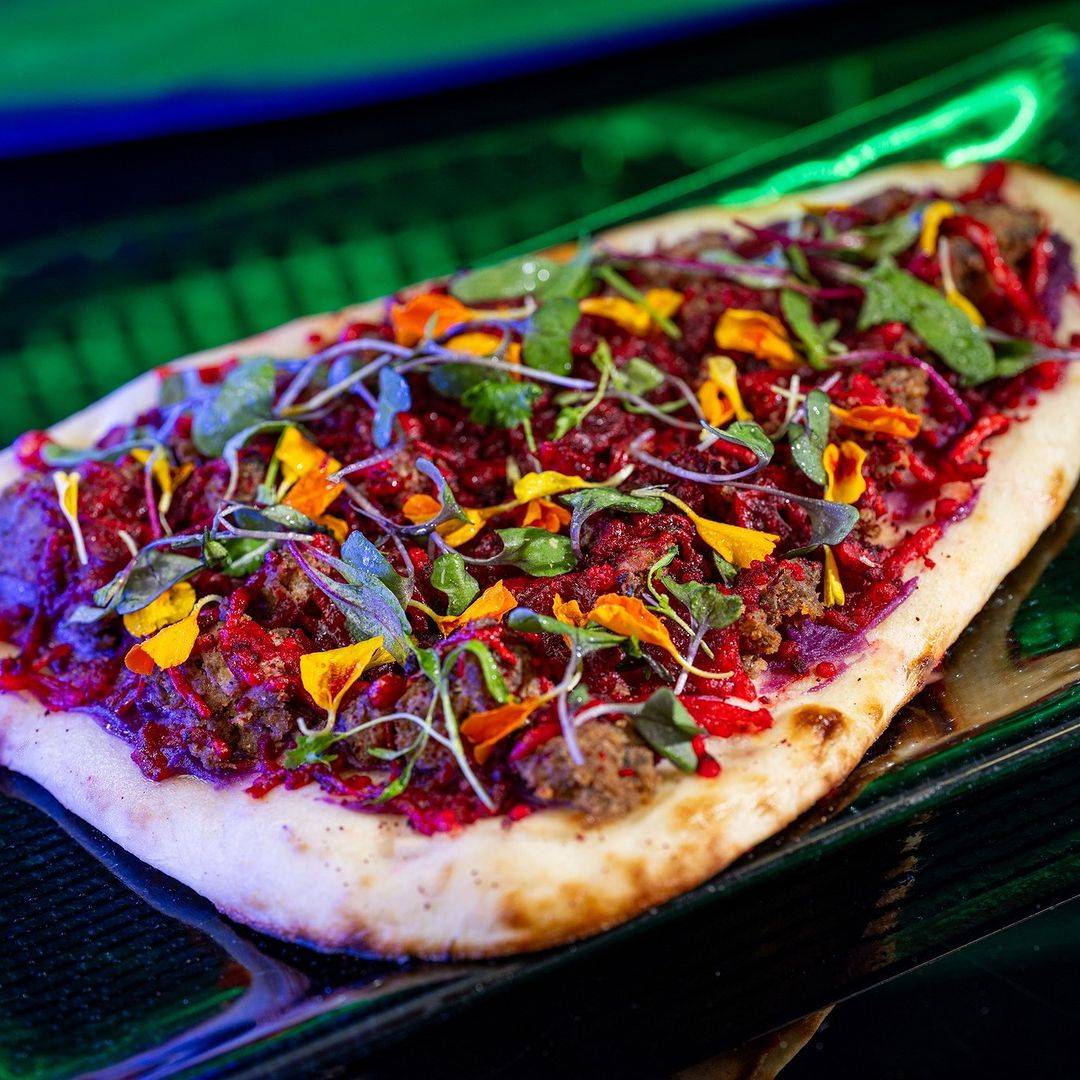 Thruster Roasted Bantha Flatbread: Naan flatbread topped with spiced chorizo beef and a four-cheese blend