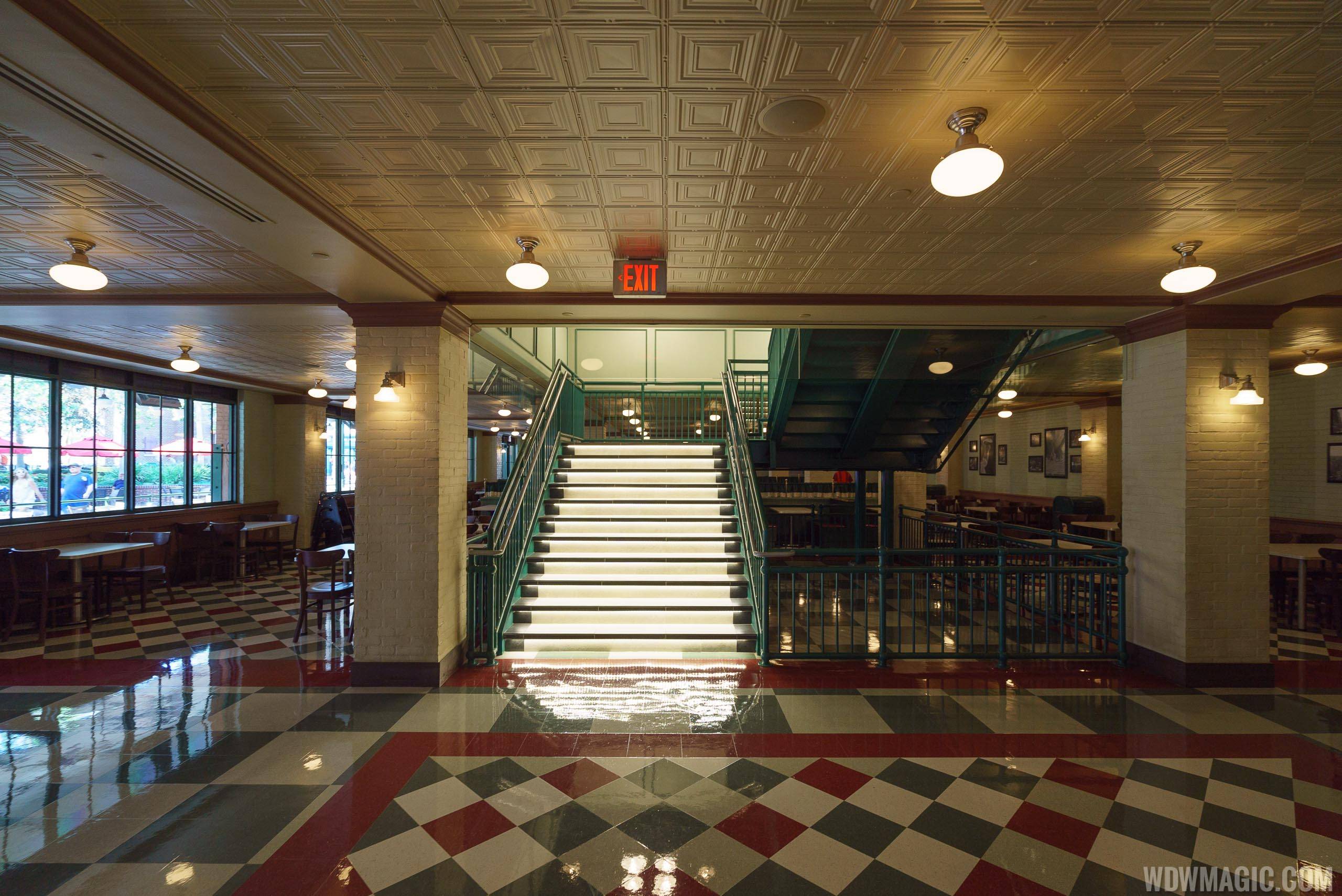 Inside PizzeRizzo - Staircase to the upper level dining room