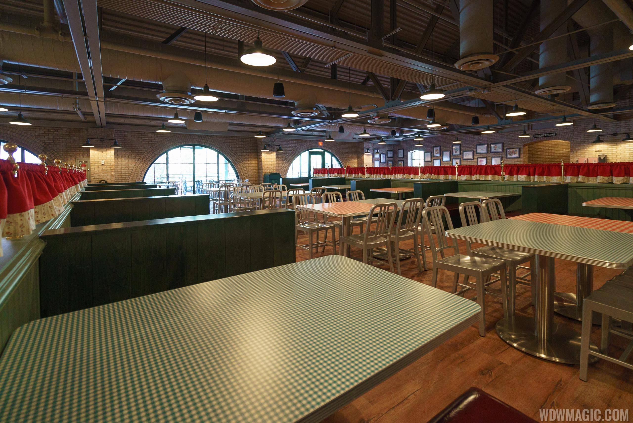 Inside PizzeRizzo - Upper level booths and tables