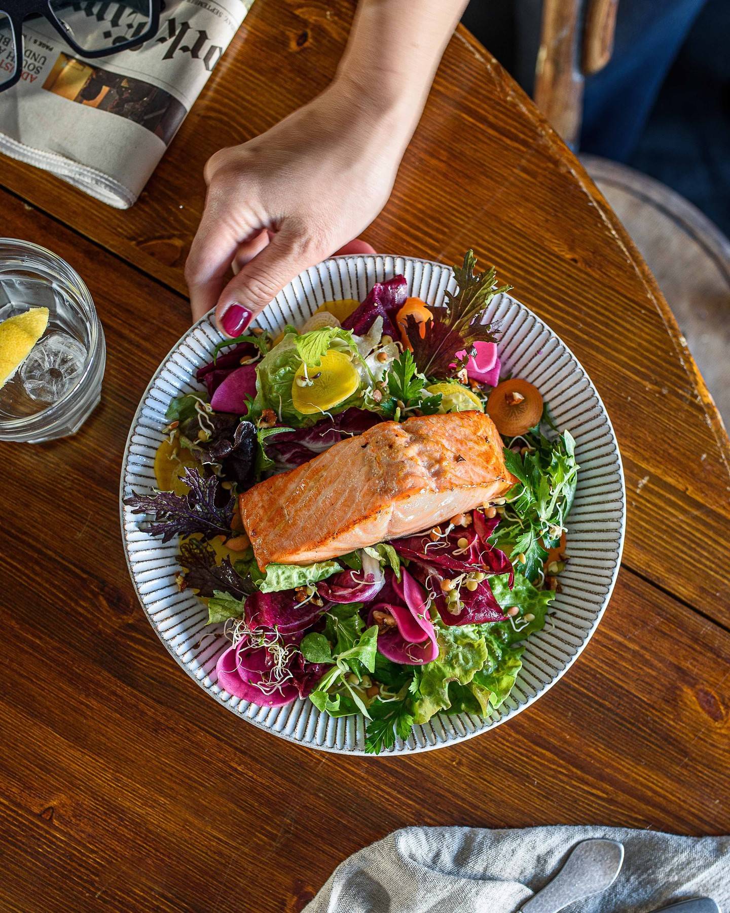 Salmon Salad: North Atlantic salmon glazed in soy, ginger, chili &amp; lime dressing, finely sliced carrots, snow peas and cucumber, Fresno chili, and tempura mushrooms, spinach leaves, radish, and garden peas