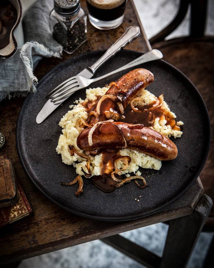 Banger + Mash = YUM: Cheshire Heritage pork Irish bangers, colcannon mashed potatoes, traditional red wine jus, and crispy fried onions