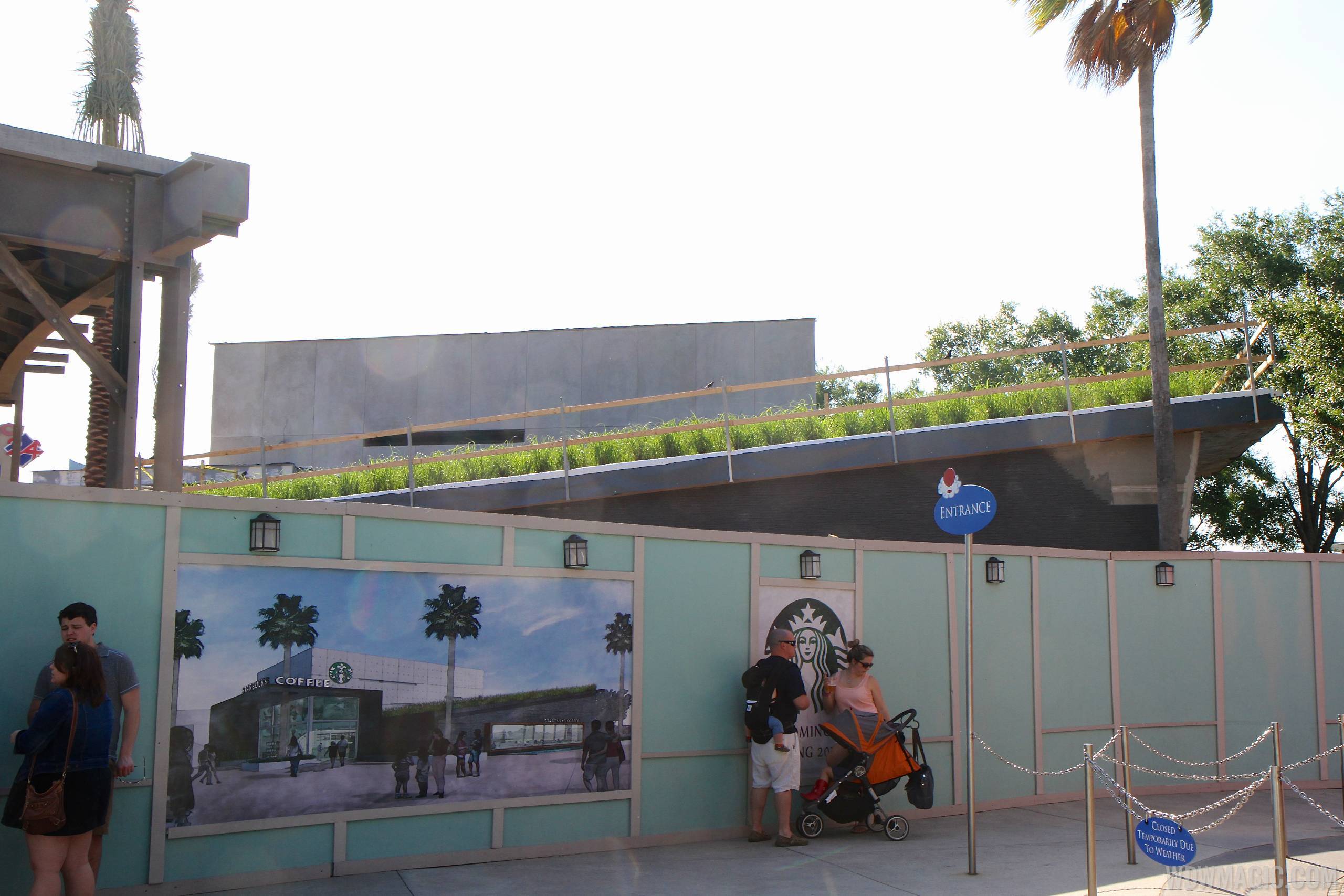 PHOTOS - Grass roof now in place on the Starbucks West Side at Downtown Disney