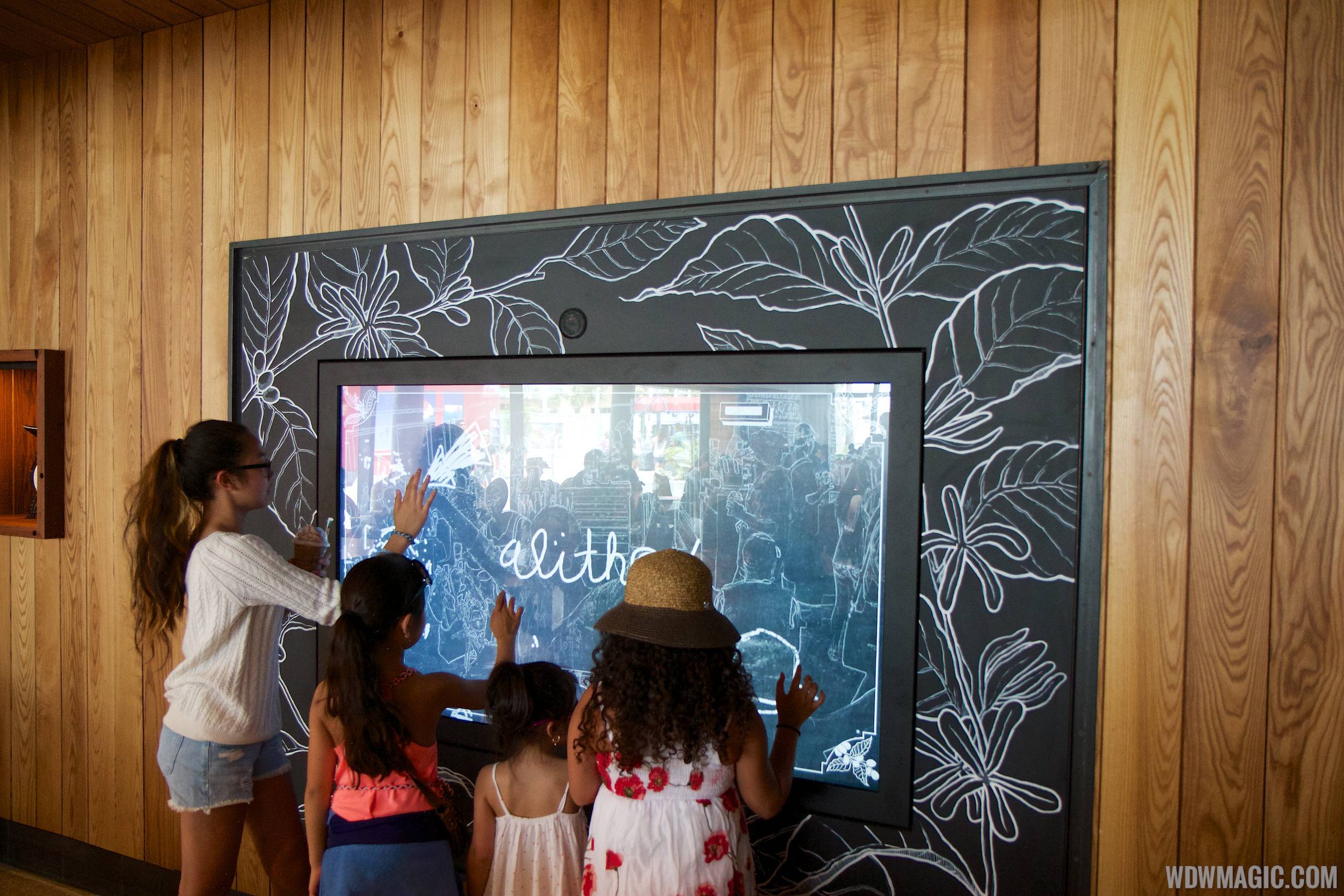 Starbucks West Side interior - Interactive touch screen linked to Disneyland
