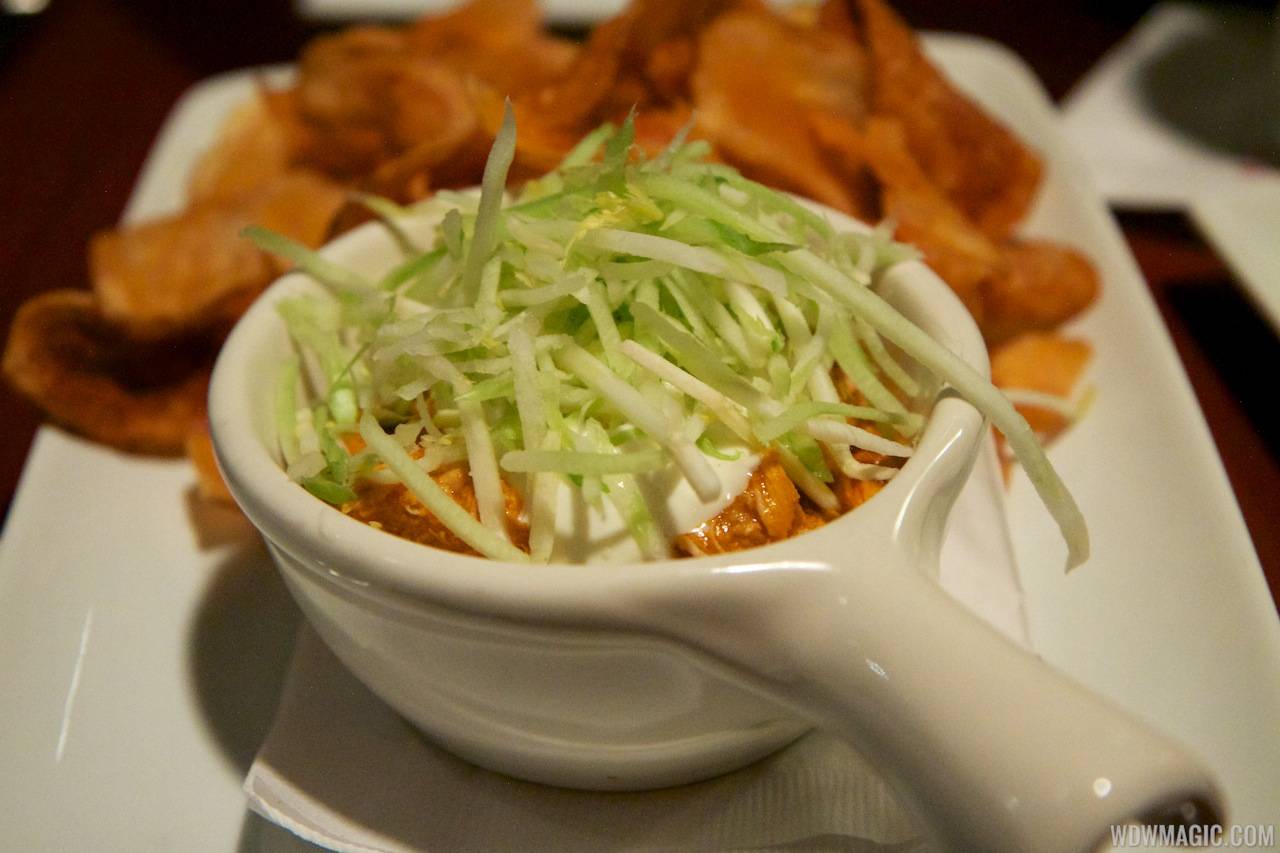 The Turf Club Bar and Grill food - Buffalo Chicken Dip Pulled Buffalo Chicken, Wing Sauce, Blue Cheese, and Celery served with our Saratoga Chips 9.49 
