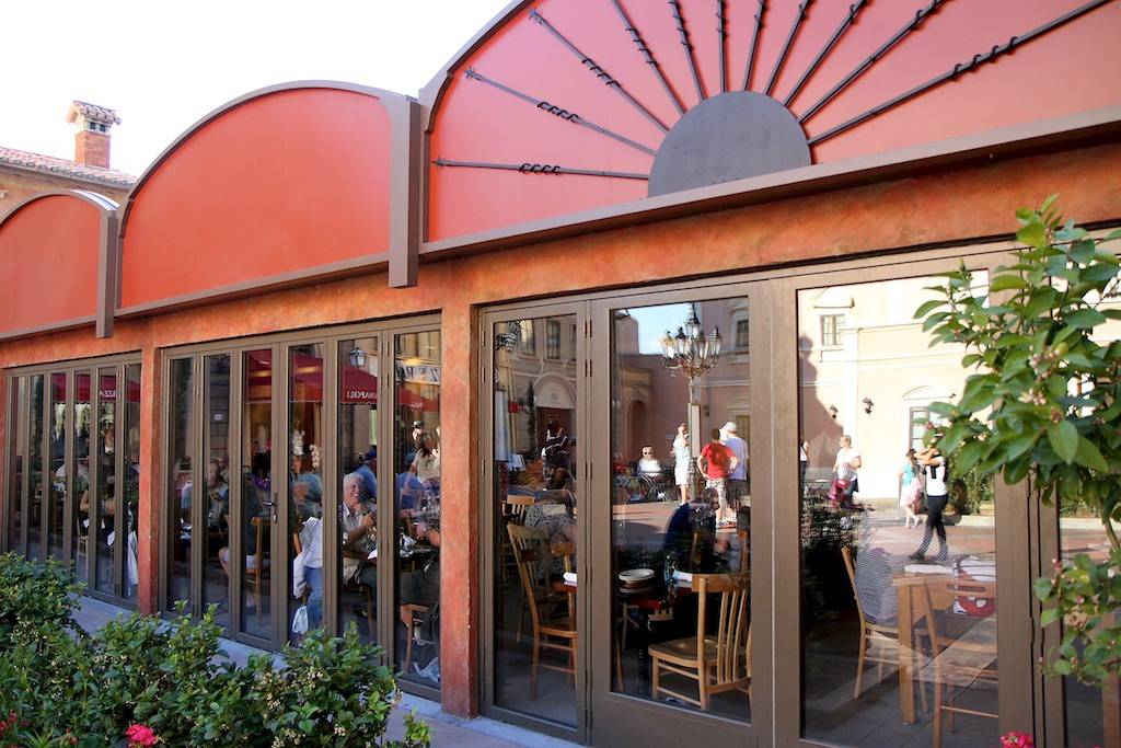 Changes at Via Napoli - covered outdoor seating area gains doors along with a new menu