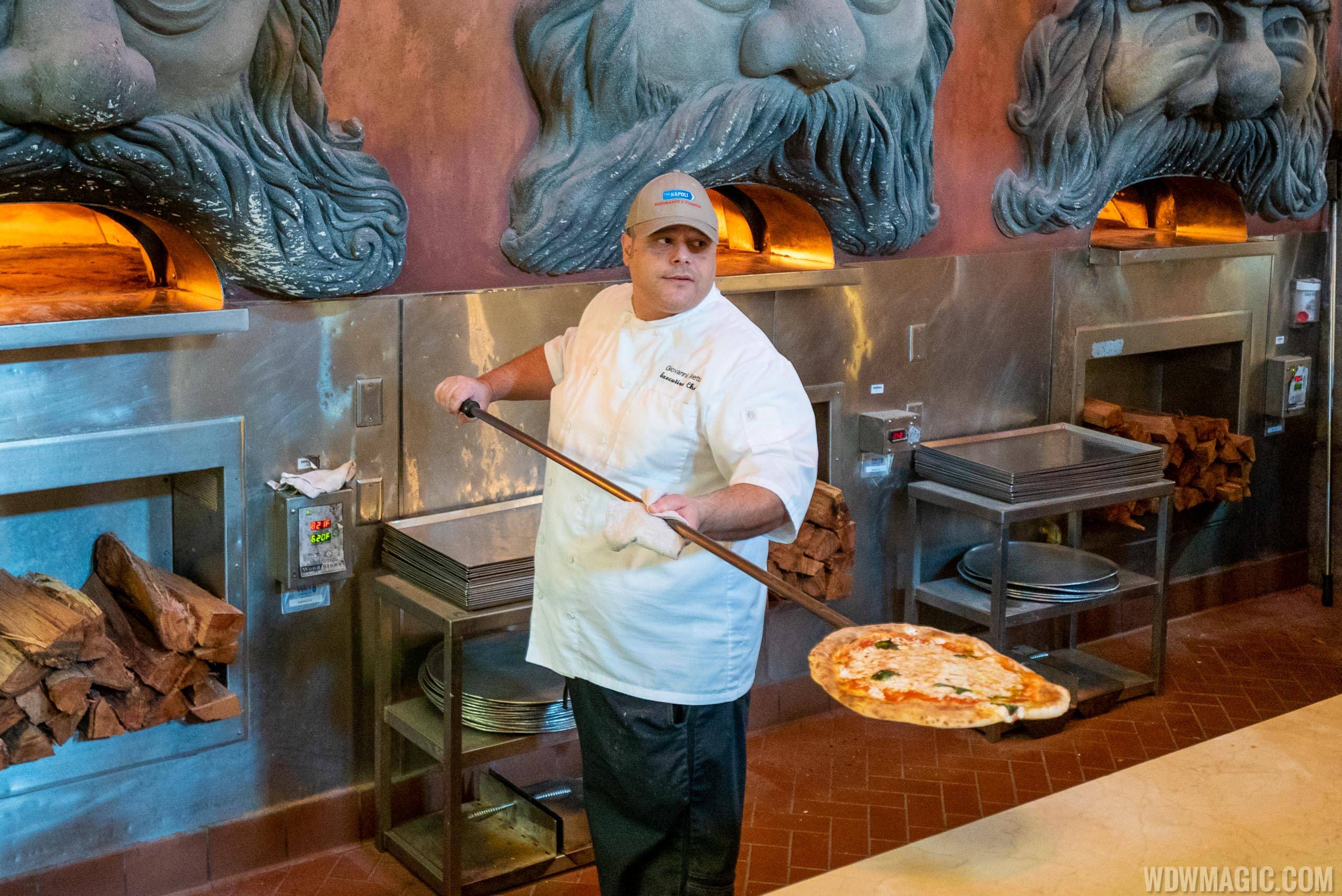 Via Napoli Executive Chef Giovanni Aletto displays the perfect pizza fresh from the oven