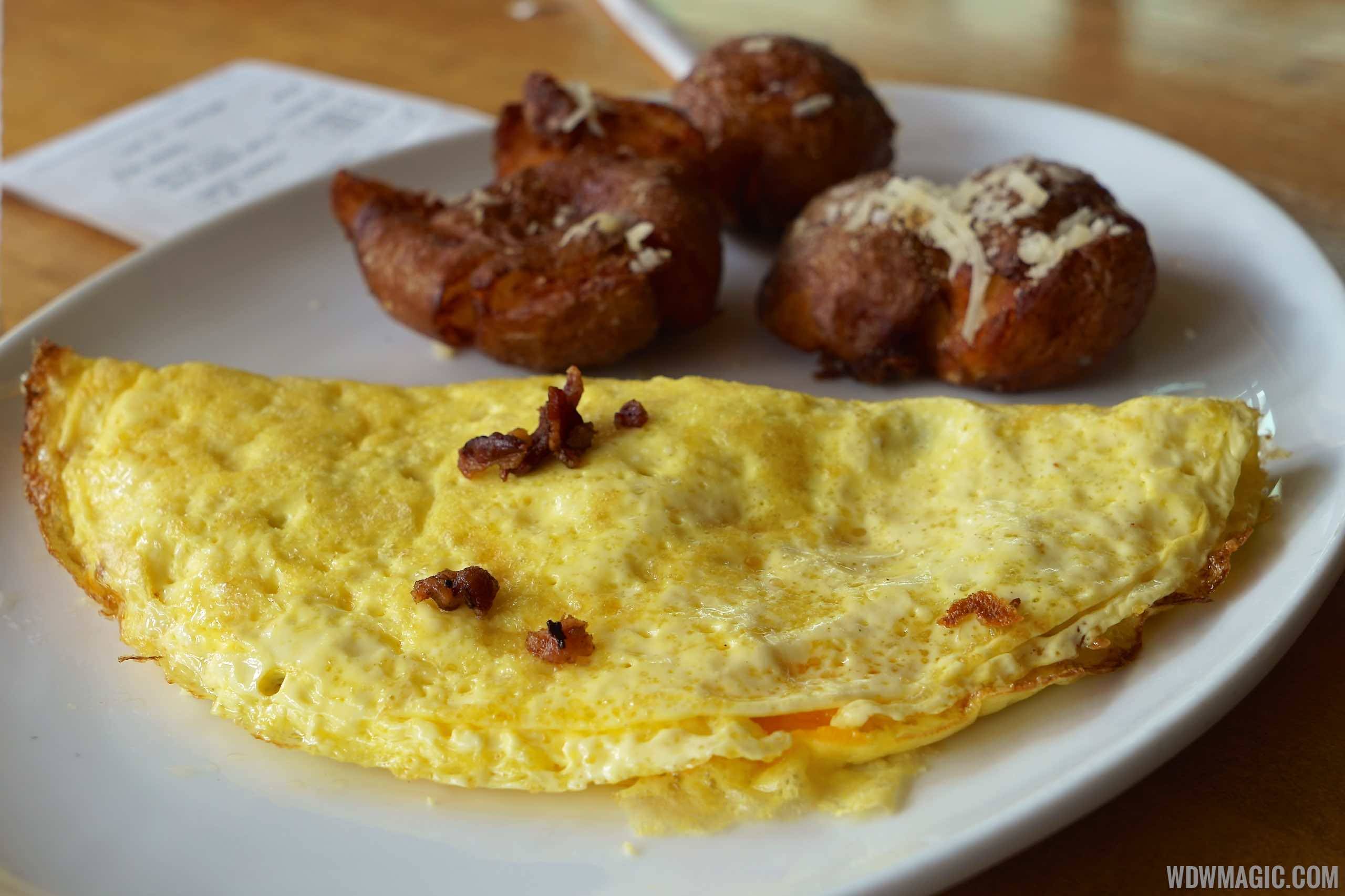 Wolfgang Puck Express Marketplace breakfast - Bacon & Cheddar Omelet with Crispy Potatoes $13.00