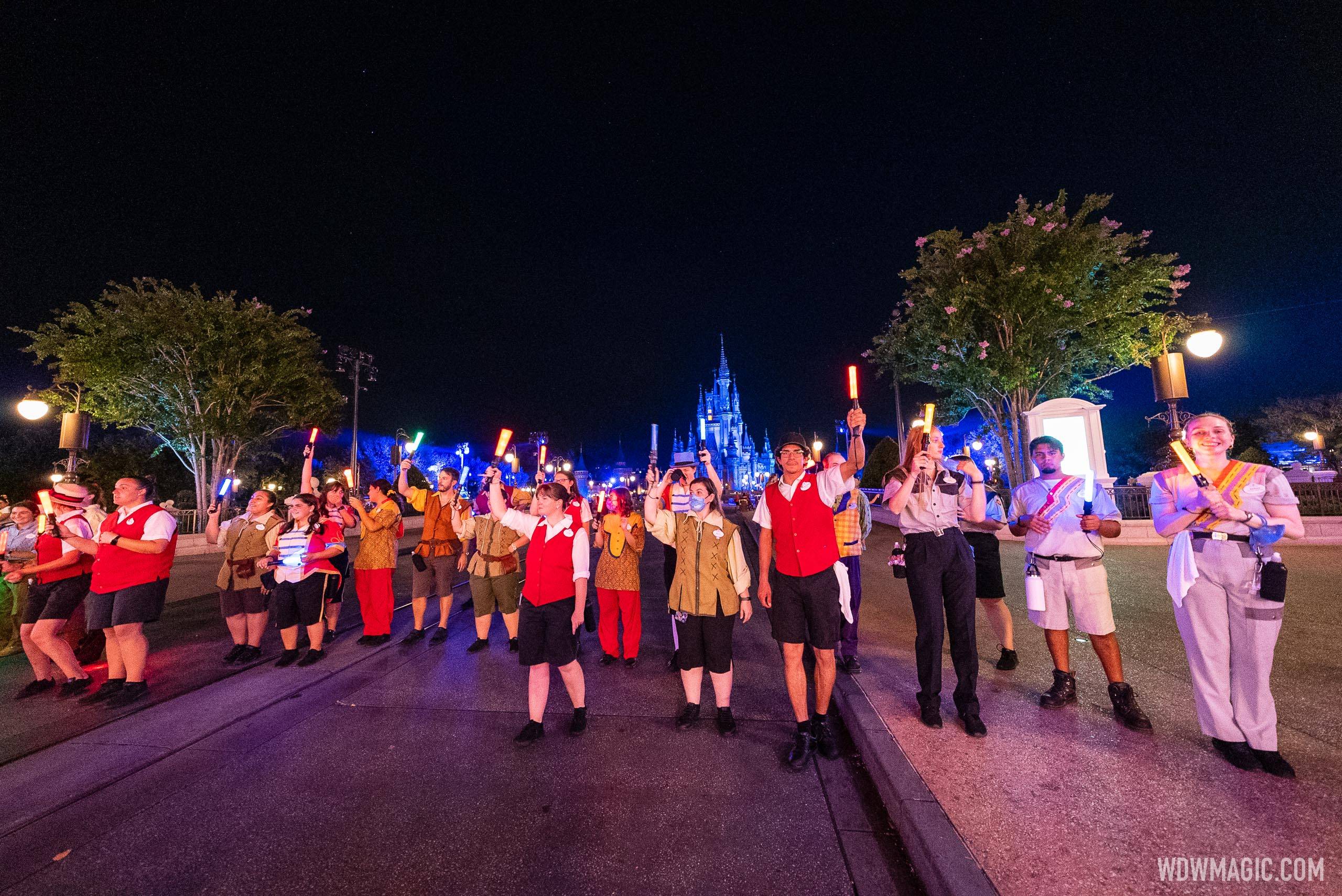 Crowd control Cast Members moving day guests along Main Street U.S.A.