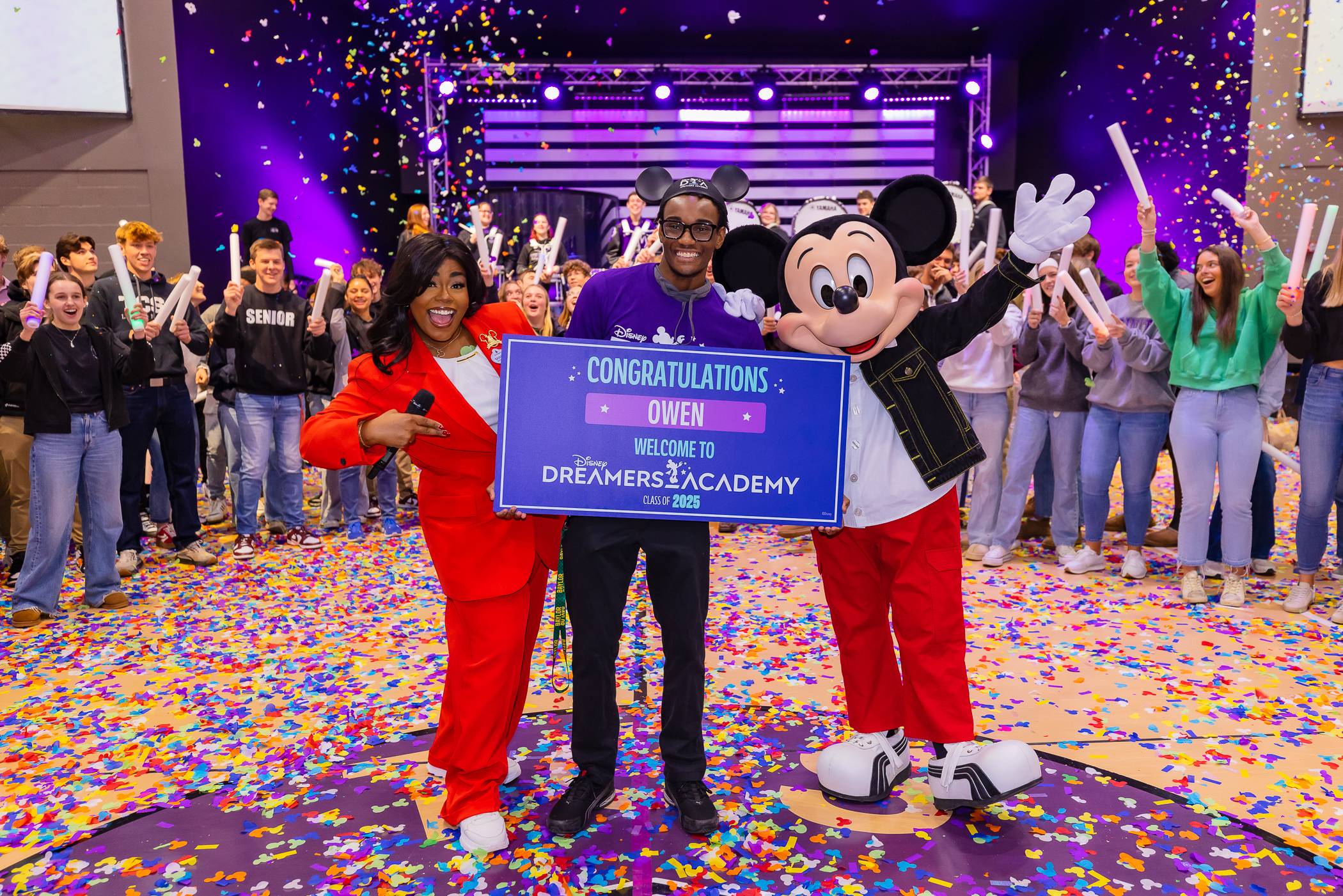 Walt Disney World Ambassador Shannon Smith-Conrad and Mickey Mouse surprise Atlanta-area student Owen Osborne at school with news of their selection to Disney Dreamers Academy