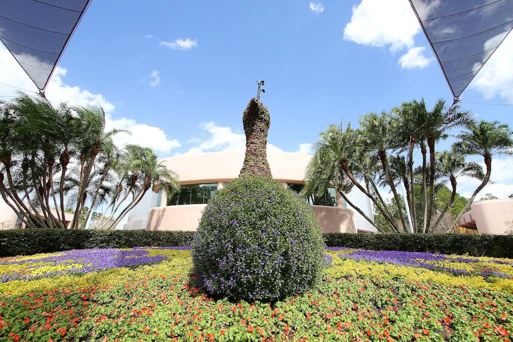 Topiary Peacock behind Spaceship Earth