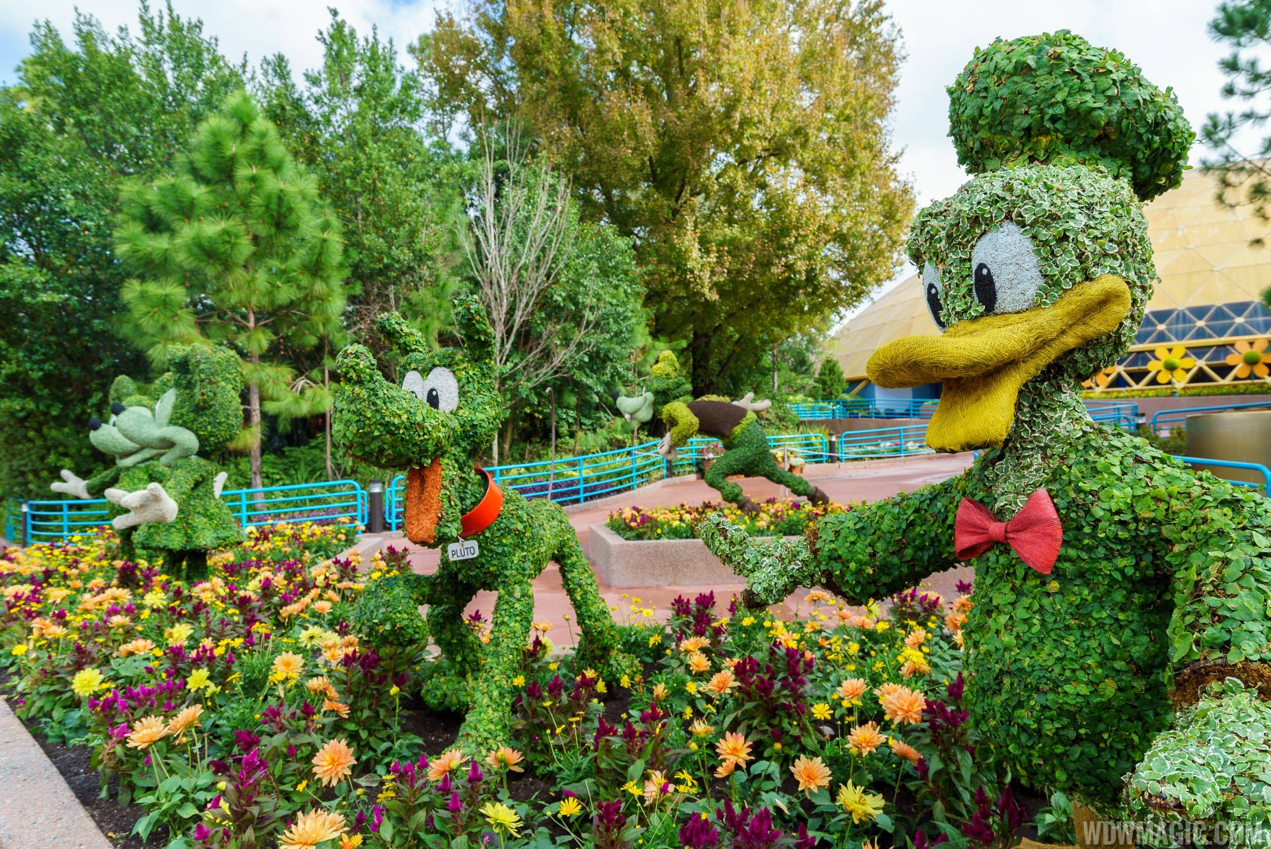 2017 Flower and Garden Festival - Donald and Pluto topiaries near Wonders of Life
