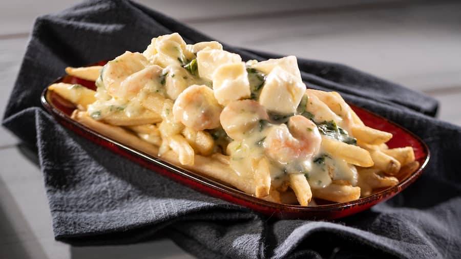 Shrimp Scampi Poutine with cheese curds, lemon-garlic cheese fondue, spinach, and artichokes (New)