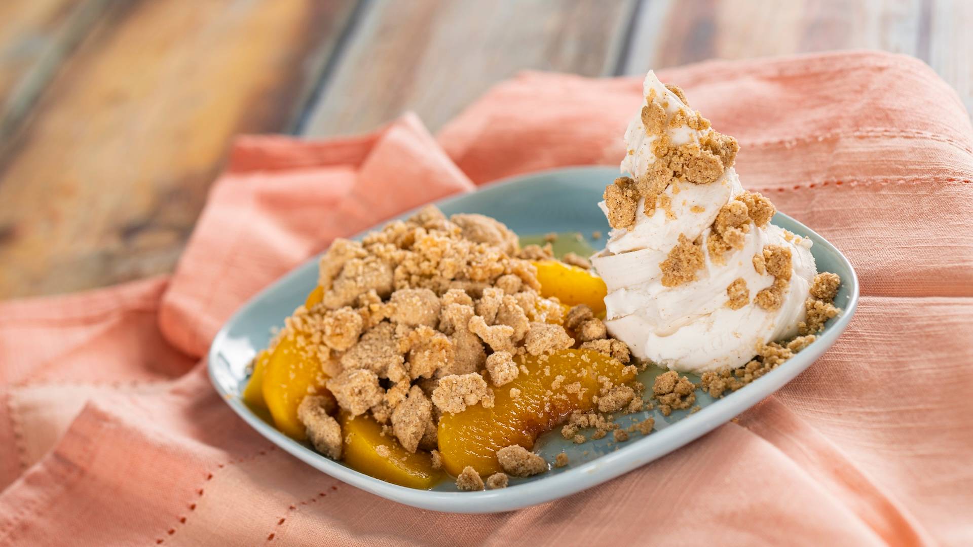 Peach Cobbler with cinnamon gelato and streusel topping
