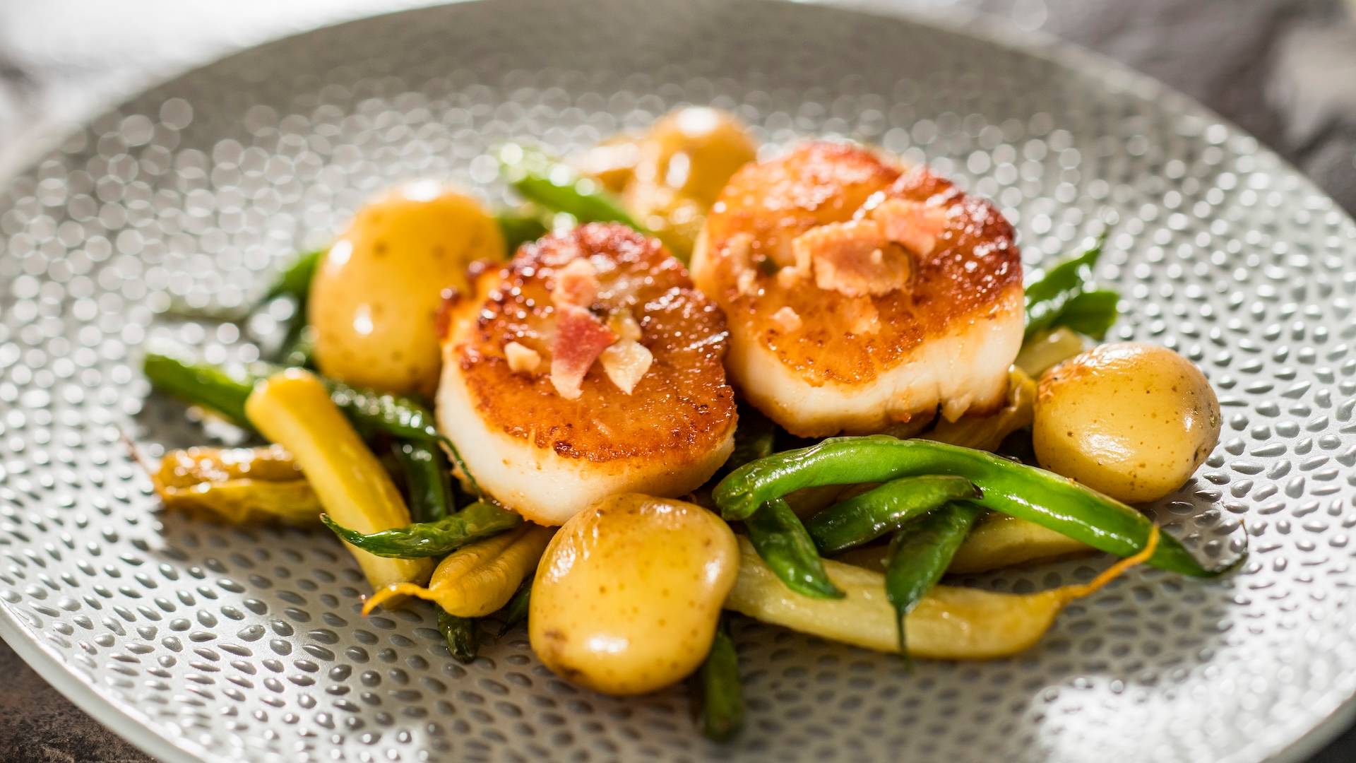 Seared Scallops with french green beans, marble potatoes, and bacon vinaigrette