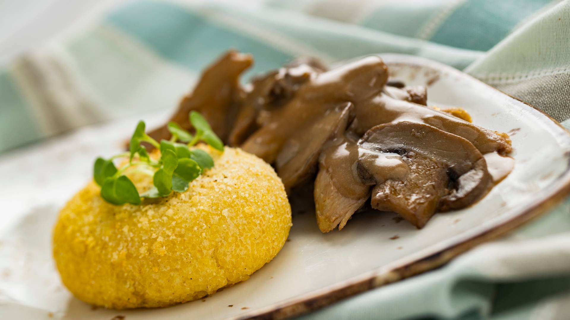 Canard Confit, Sauce Romarin et Champignons, Gateau de Polenta aux Herbes: Pulled duck confit with rosemary-mushroom sauce and herbed polenta corn cake (New)