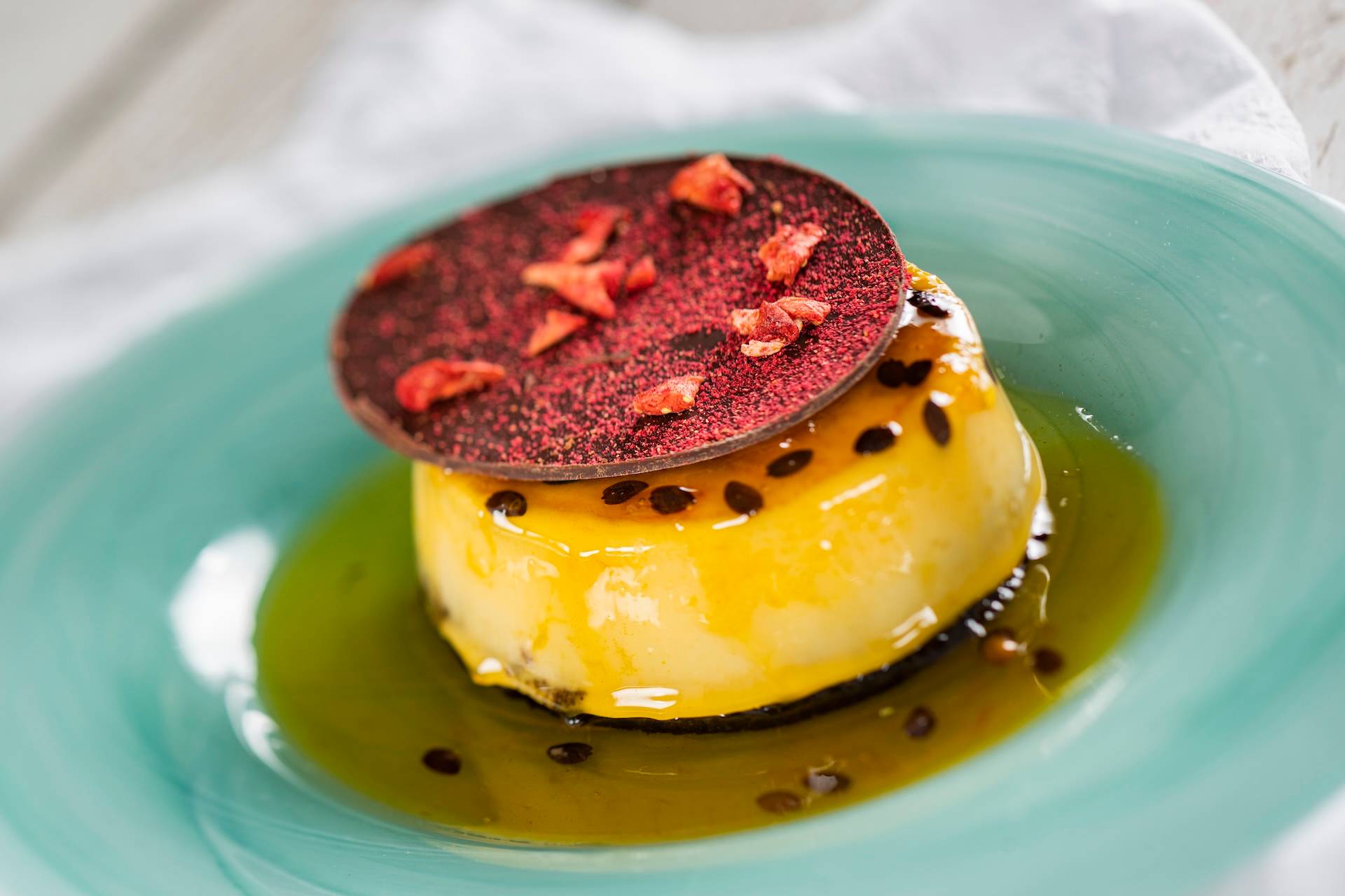 Coconut-Chocolate Flan Bizcocho: Chocolate cake, coconut custard, and passion fruit caramel (Plant-based)