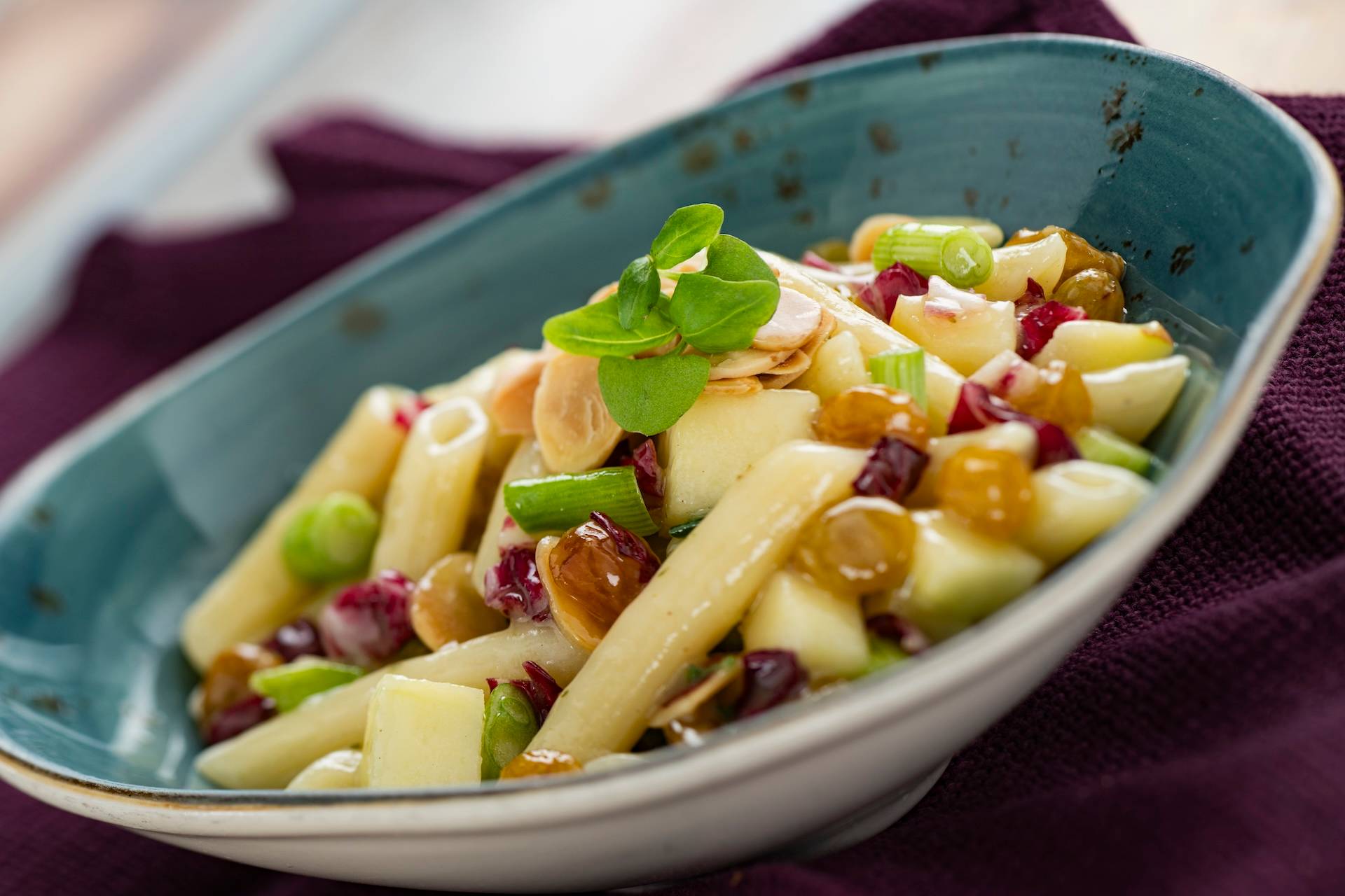 Insalata di Pasta: Penne, apple, raisins, scallions, almonds, honey, and lemon dressing (Served chilled) (New)