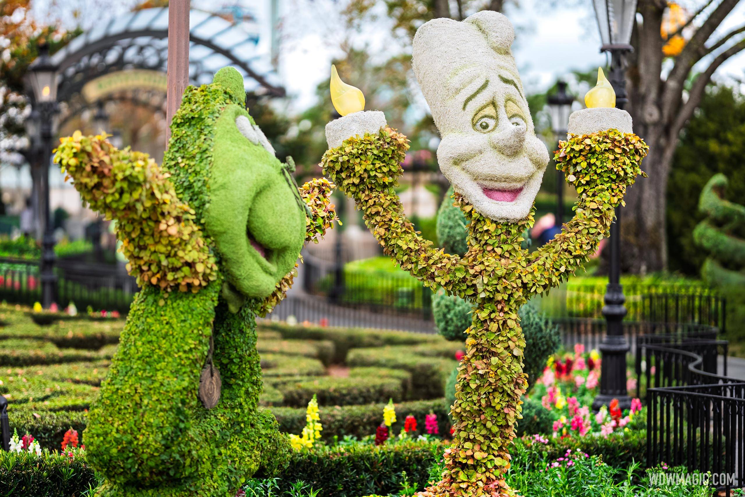 Cogsworth and Lumiere at the France Pavilion