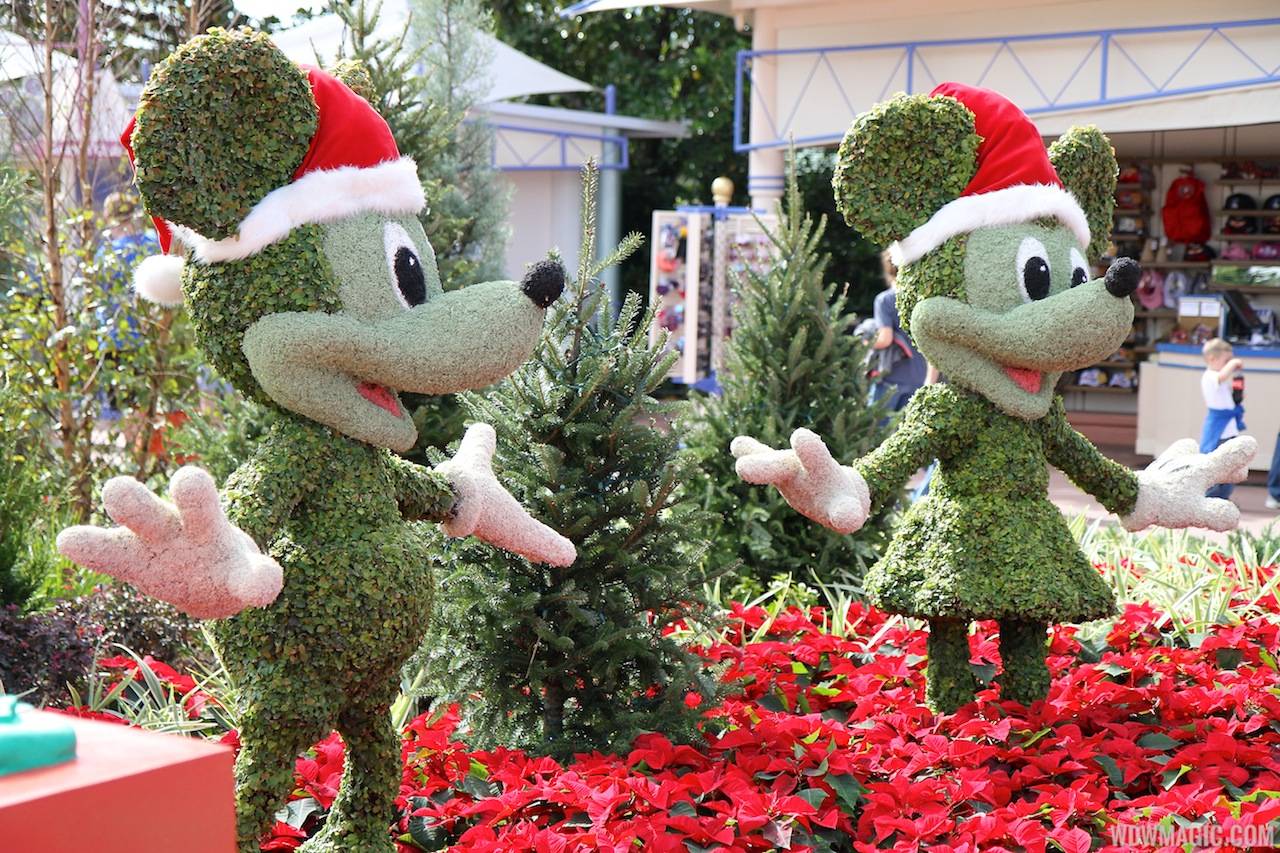 Epcot Main entrance decorations for 2012 - Mickey and Minnie Topiary on the Bridge to World Showcase
