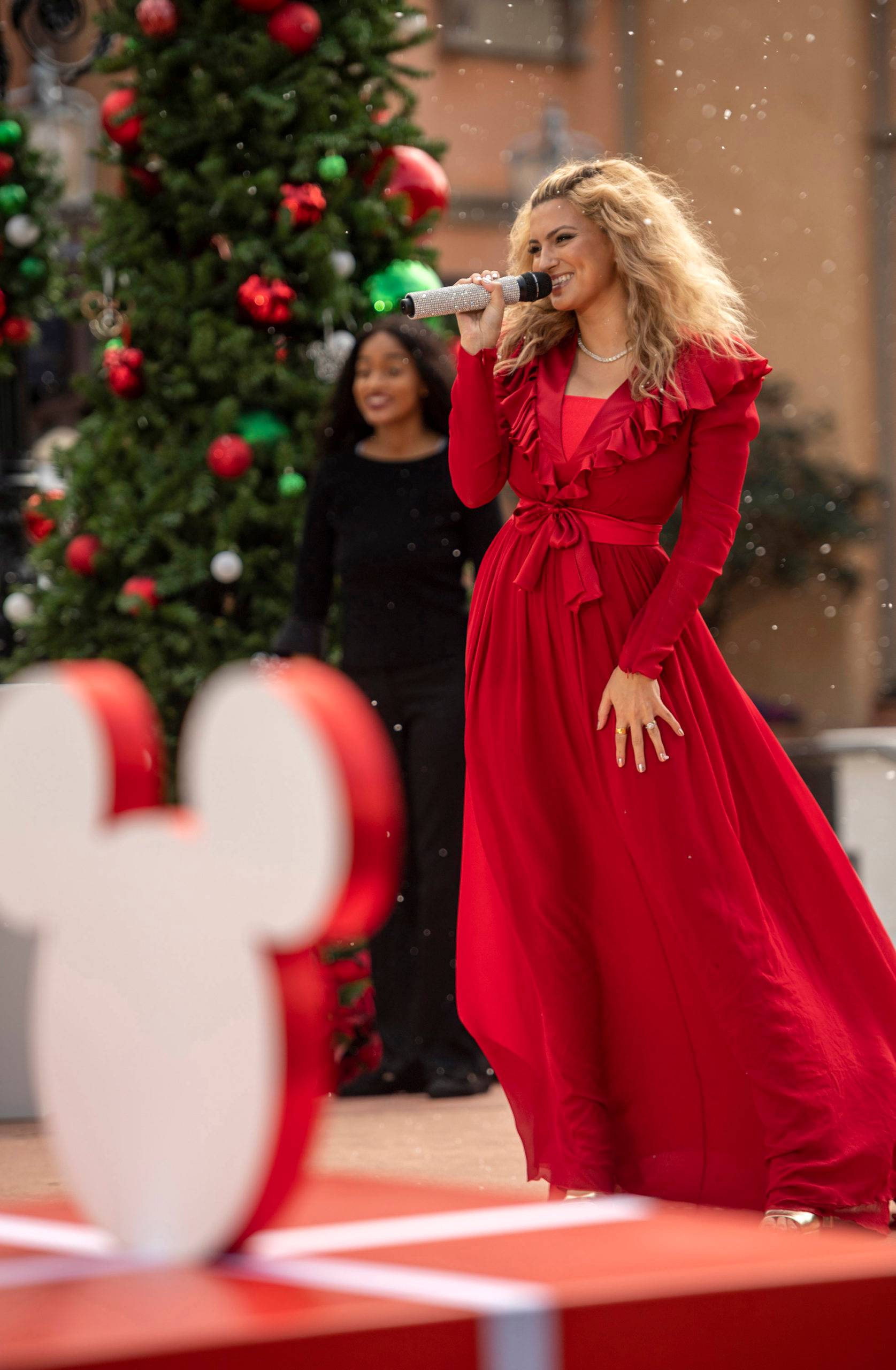 Tori Kelly performs with the Florida A&M University Choir at EPCOT