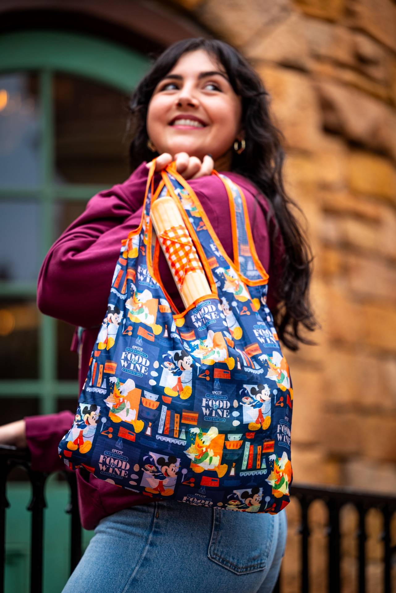 The 2026 EPCOT International Food & Wine Festival churro tote bag, featuring an all-over Mickey and friends chef print