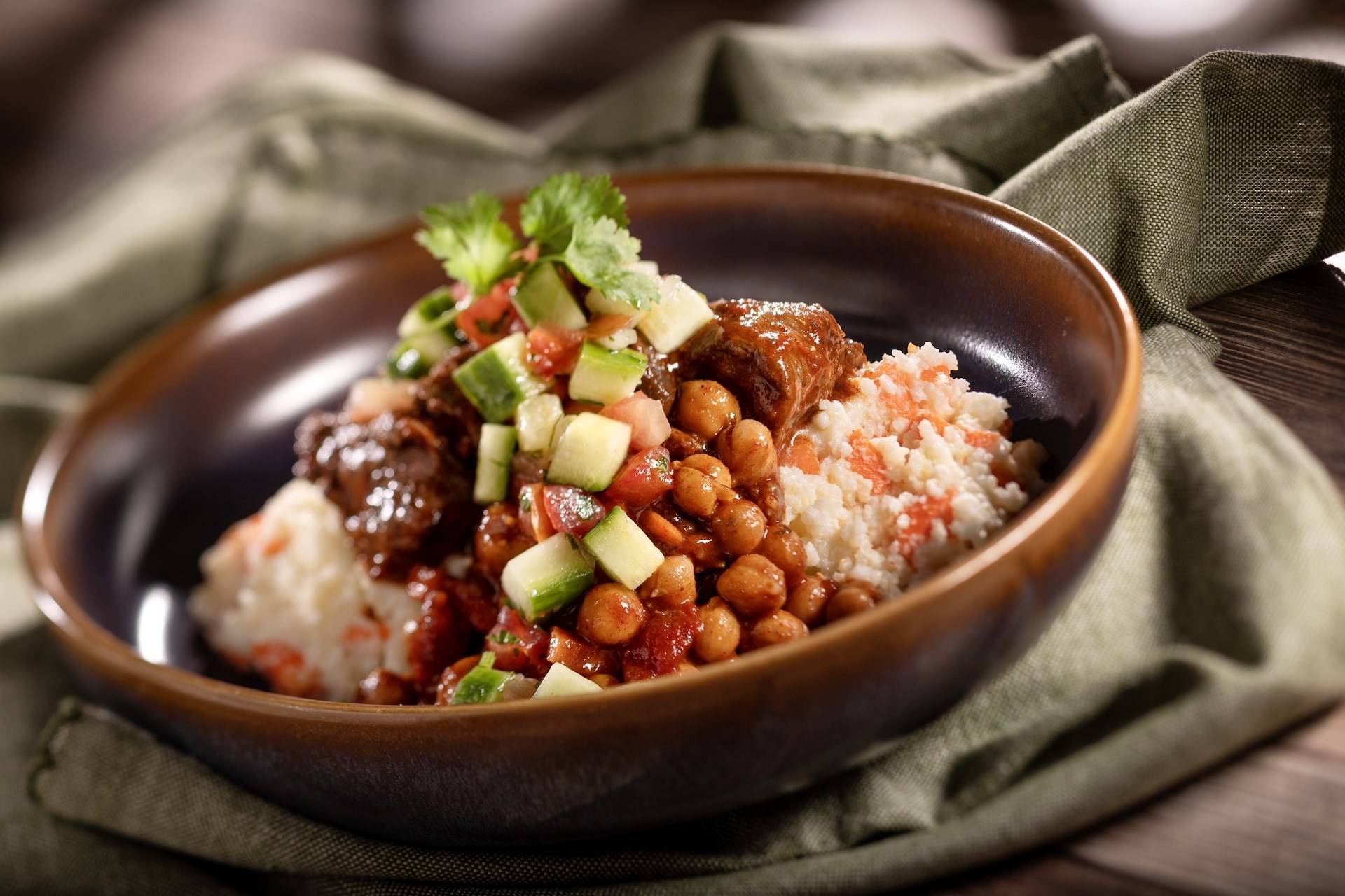 Berbere Spiced Beef Stew with Sweet Potato Mealie Pap and Kachumbari Slaw
